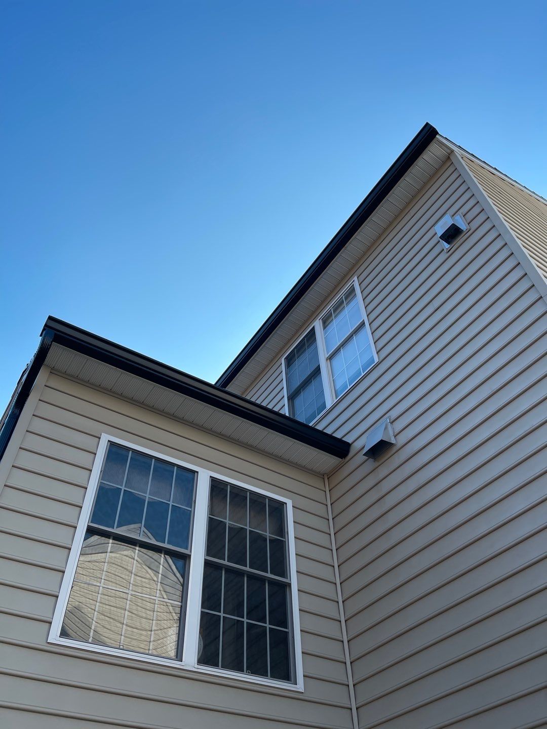 Tesla Solar Roof and Gutter Installation by American Home Contractors