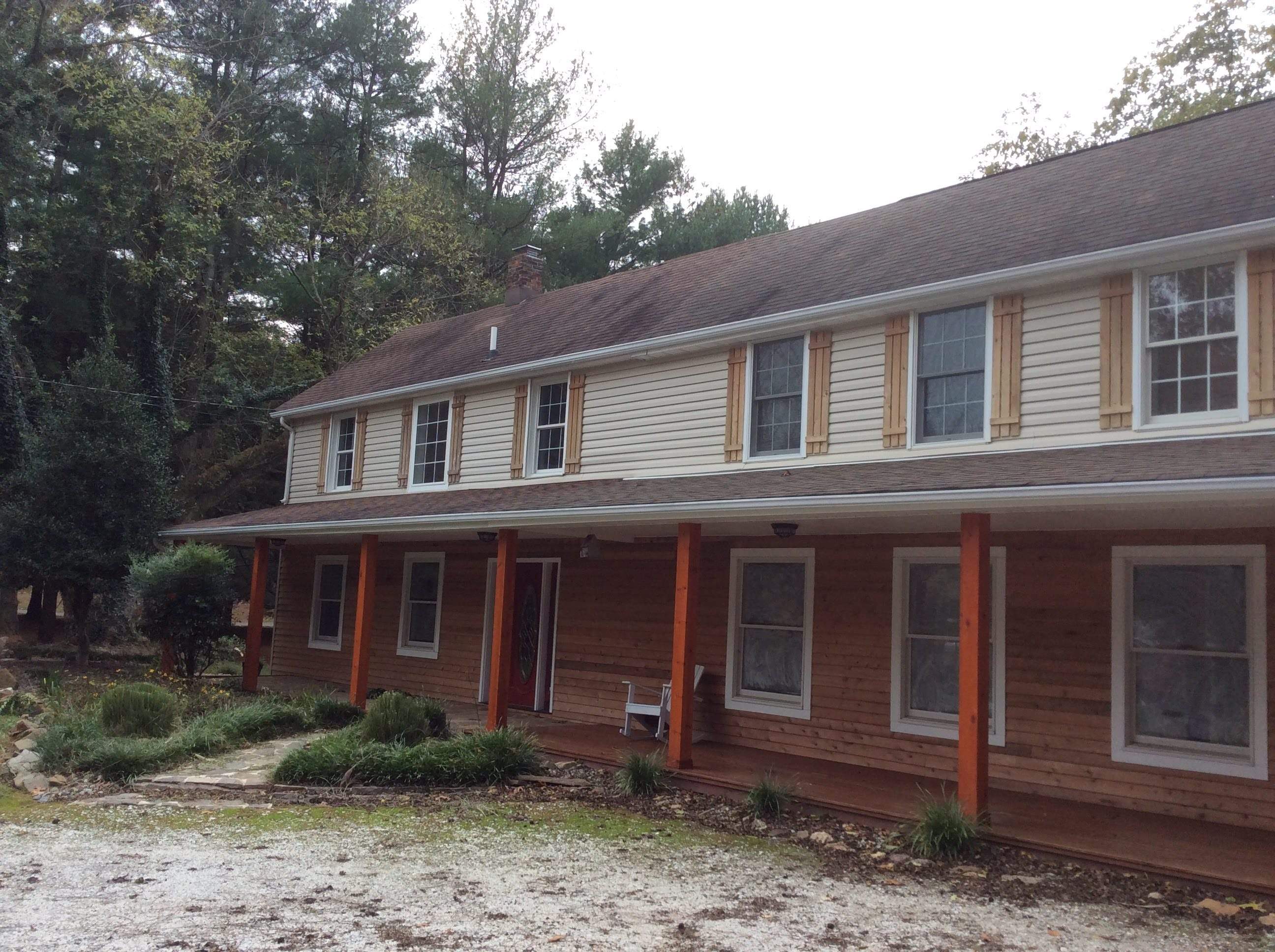 Residential Roofing Installation using Resawn Shake Shingles by Alpha Design Services