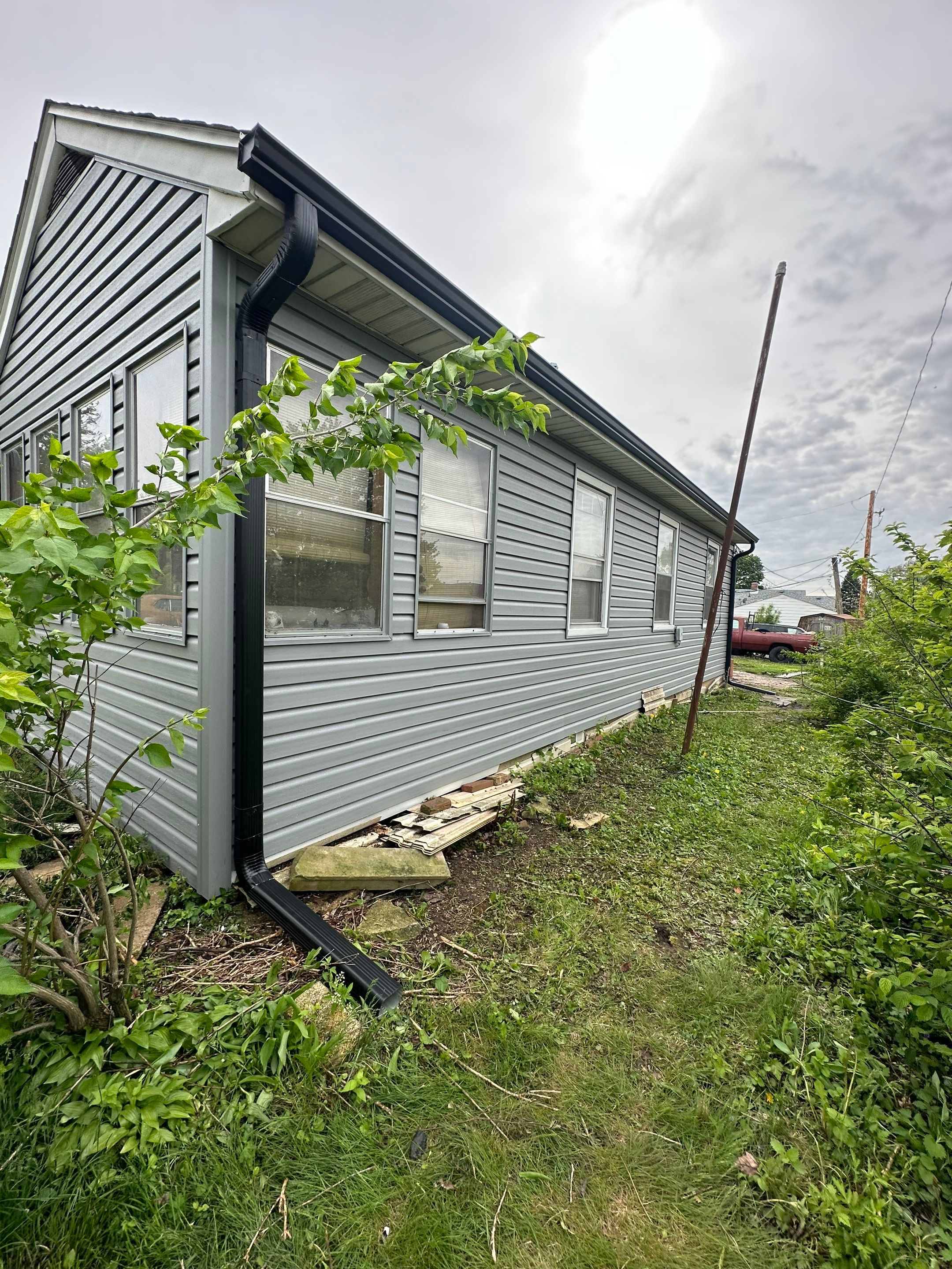Siding replacement by Optimal Home Improvement 