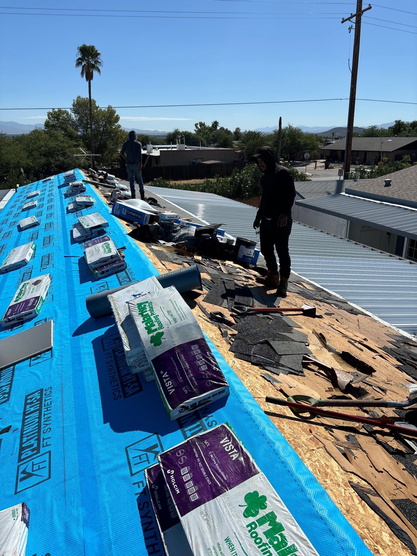 Estate Gray Shingles by Reimagine Roofing