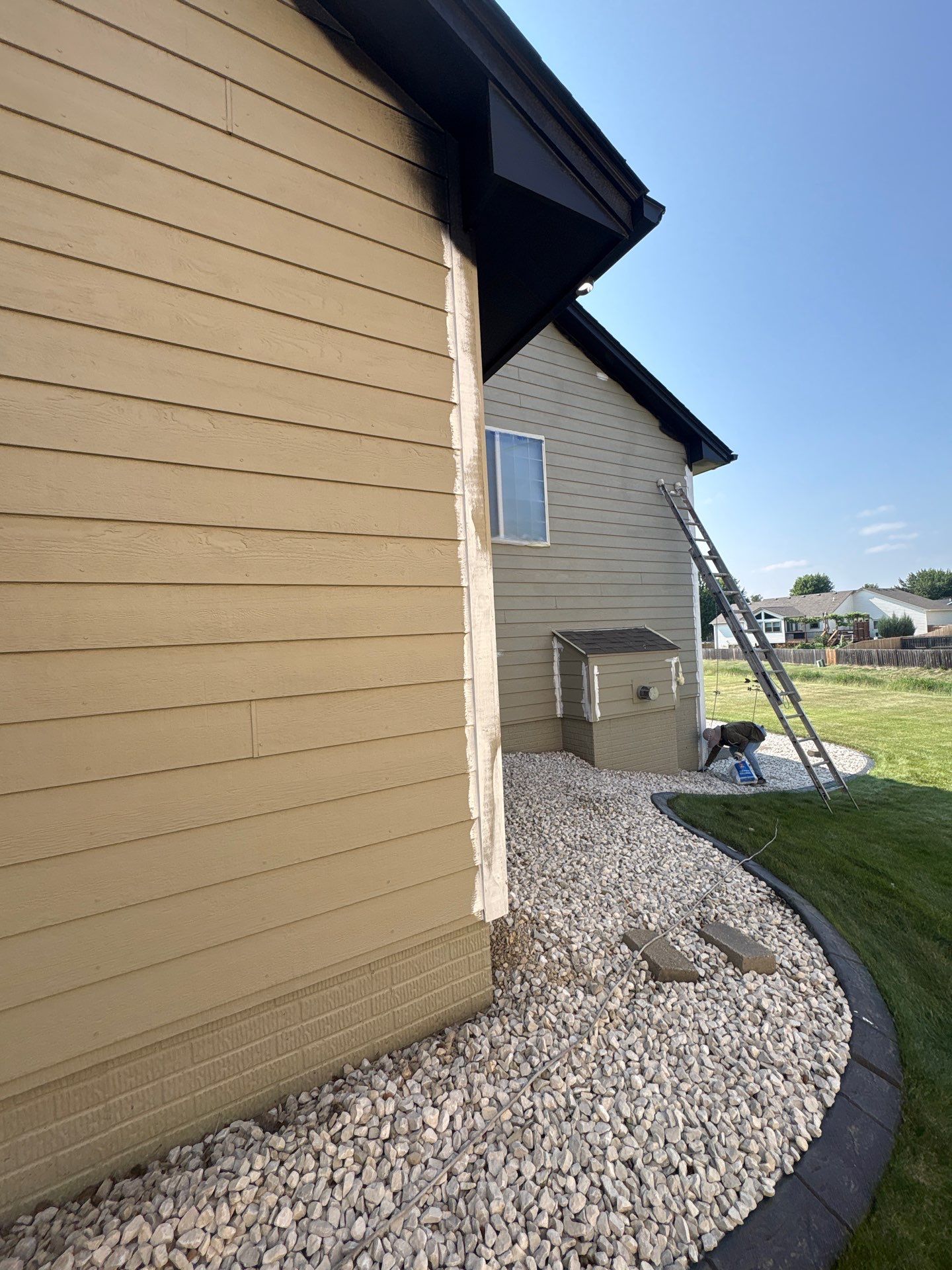 Residential Exterior Painting and Siding Refresh in Sioux Falls by Select Painting, Coatings & Garage Cabinets