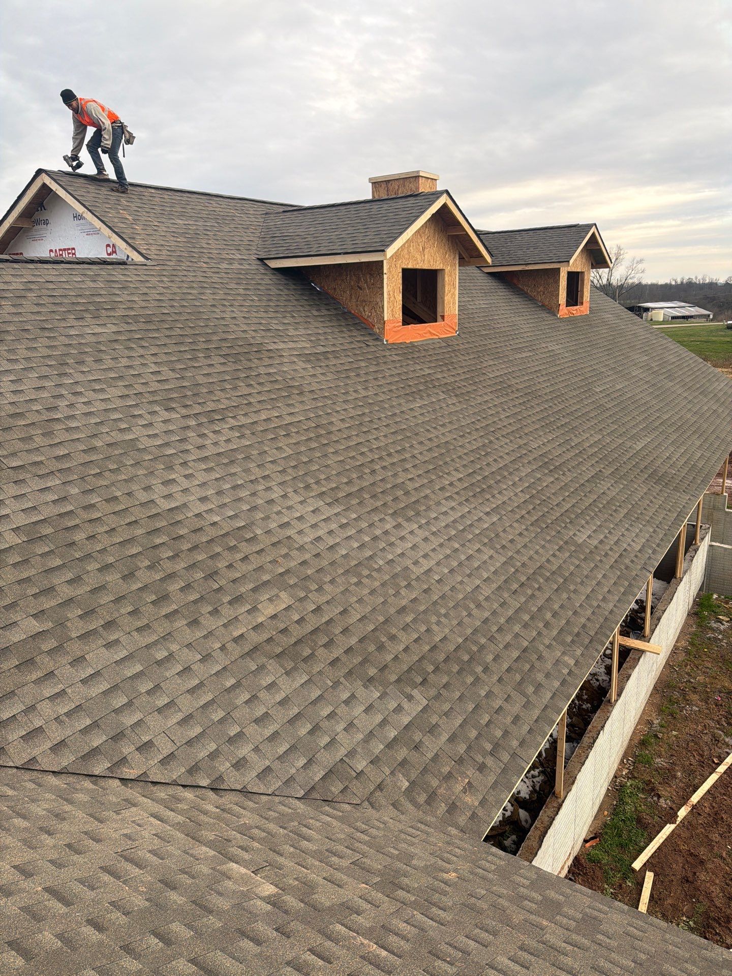 Residential Roofing Installation using GAF Timberline HDZ Weathered Wood by Rainstoppers Roofing