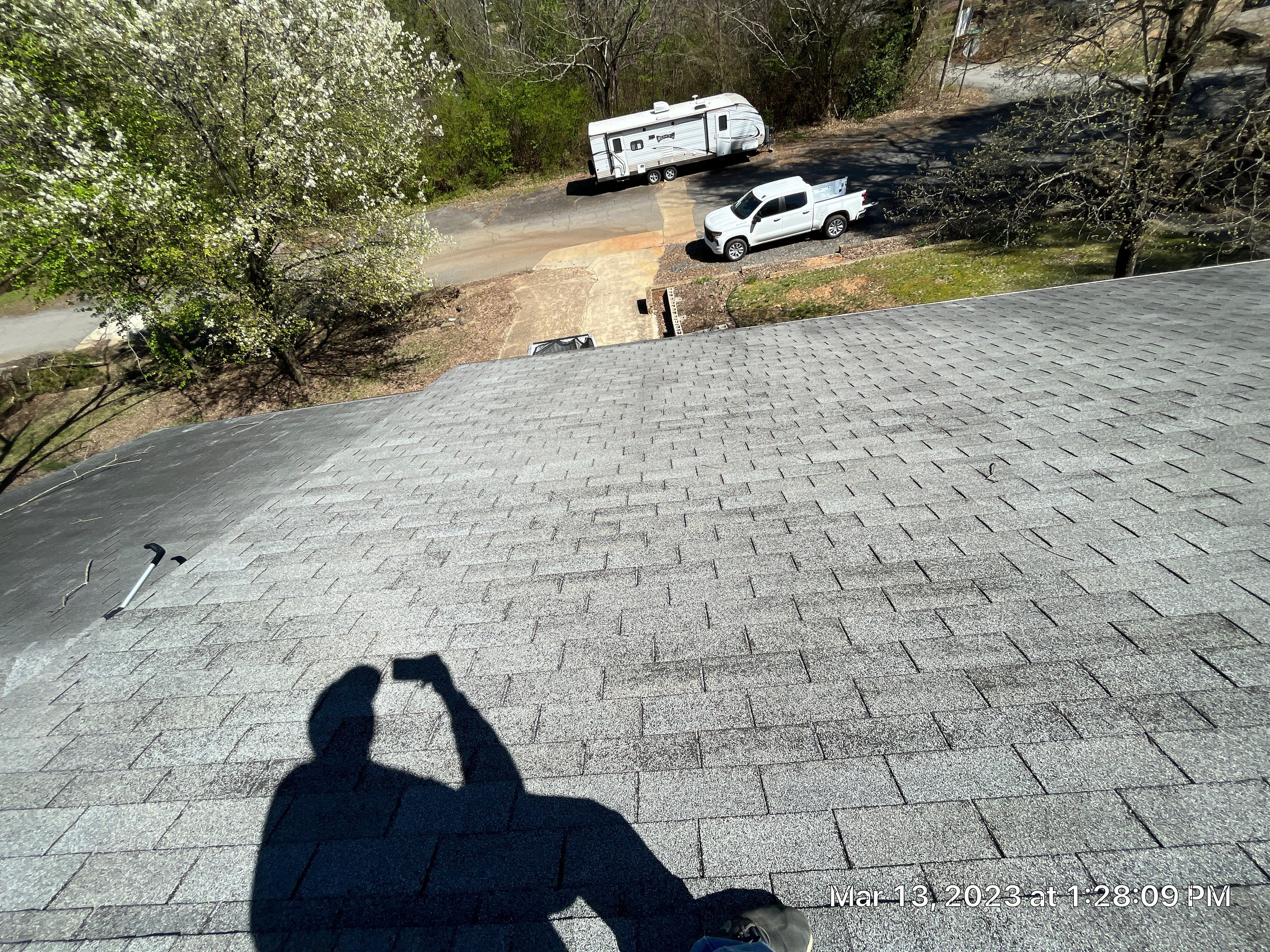 Residential Roofing Installation using 26 Gauge Colored Panels by Hostetler Roofing