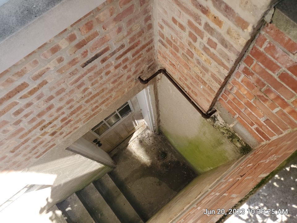 natural stone cleaning using Algaecide, soft wash soap by Northern Power Washing LLC.