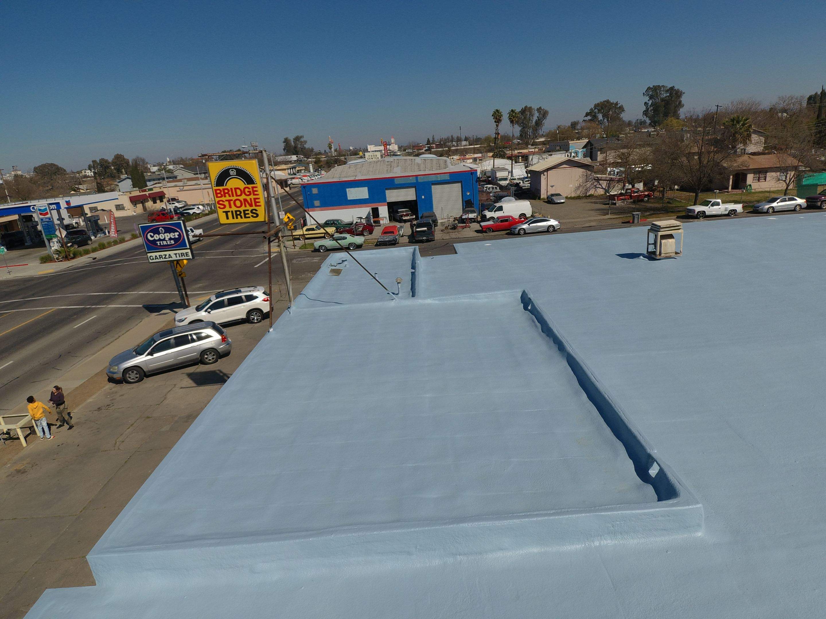 Spray foam and coatings using Conklin Benchmark/PUMA XL coatings and spray foam by Straight Edge Roofing Inc