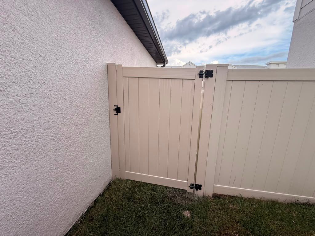 Tan Vinyl Privacy Fence Installation for Sarasota Home by True Fence LLC