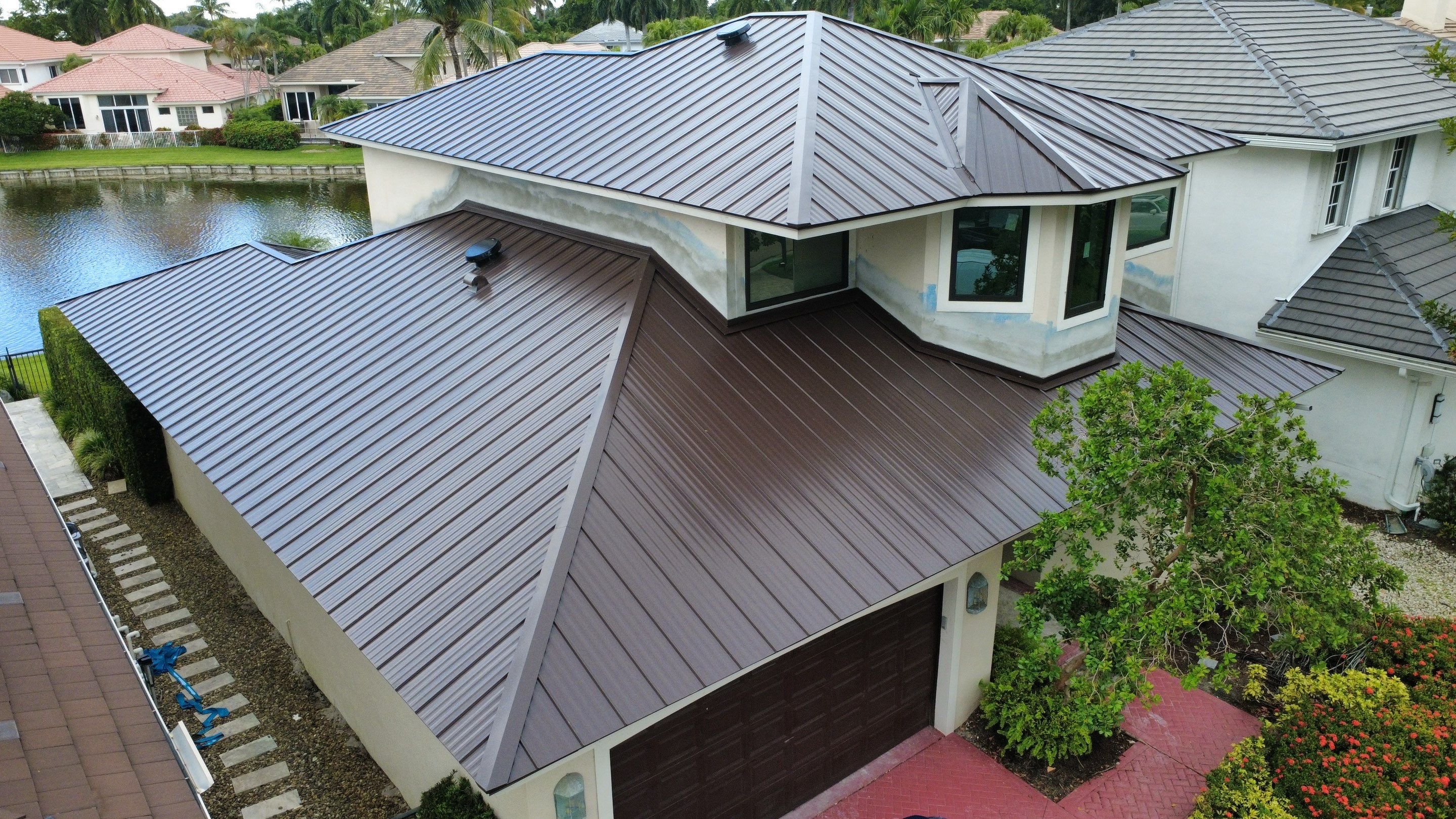 Residential Roofing Installation using 1" Nail strip metal roof by BLUES BROTHERS ROOFING