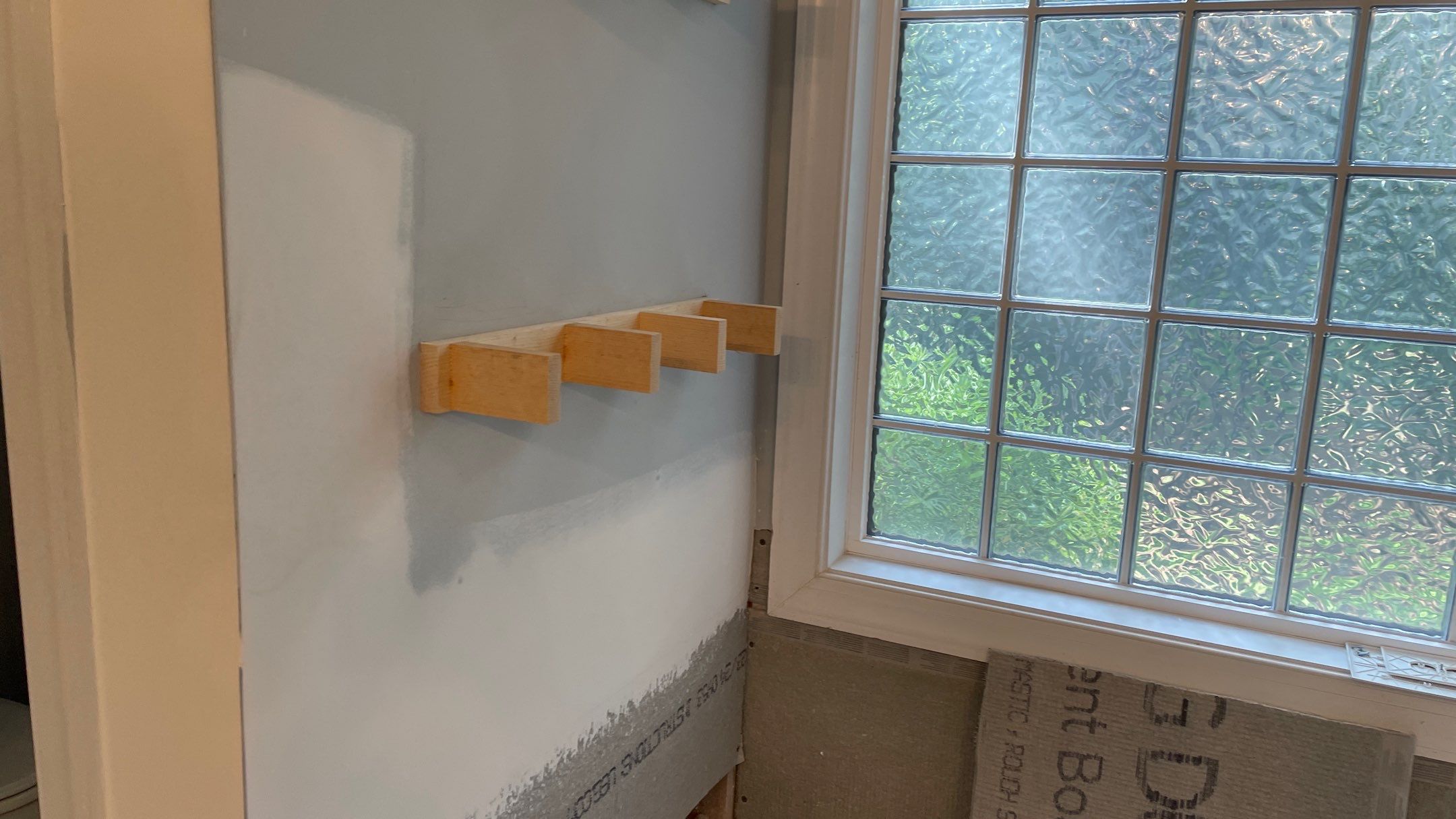 Bright Bathroom Remodel with Wall Removal, Stand Alone Tub and New Vanity by Footprints Floors of Coastal Carolina