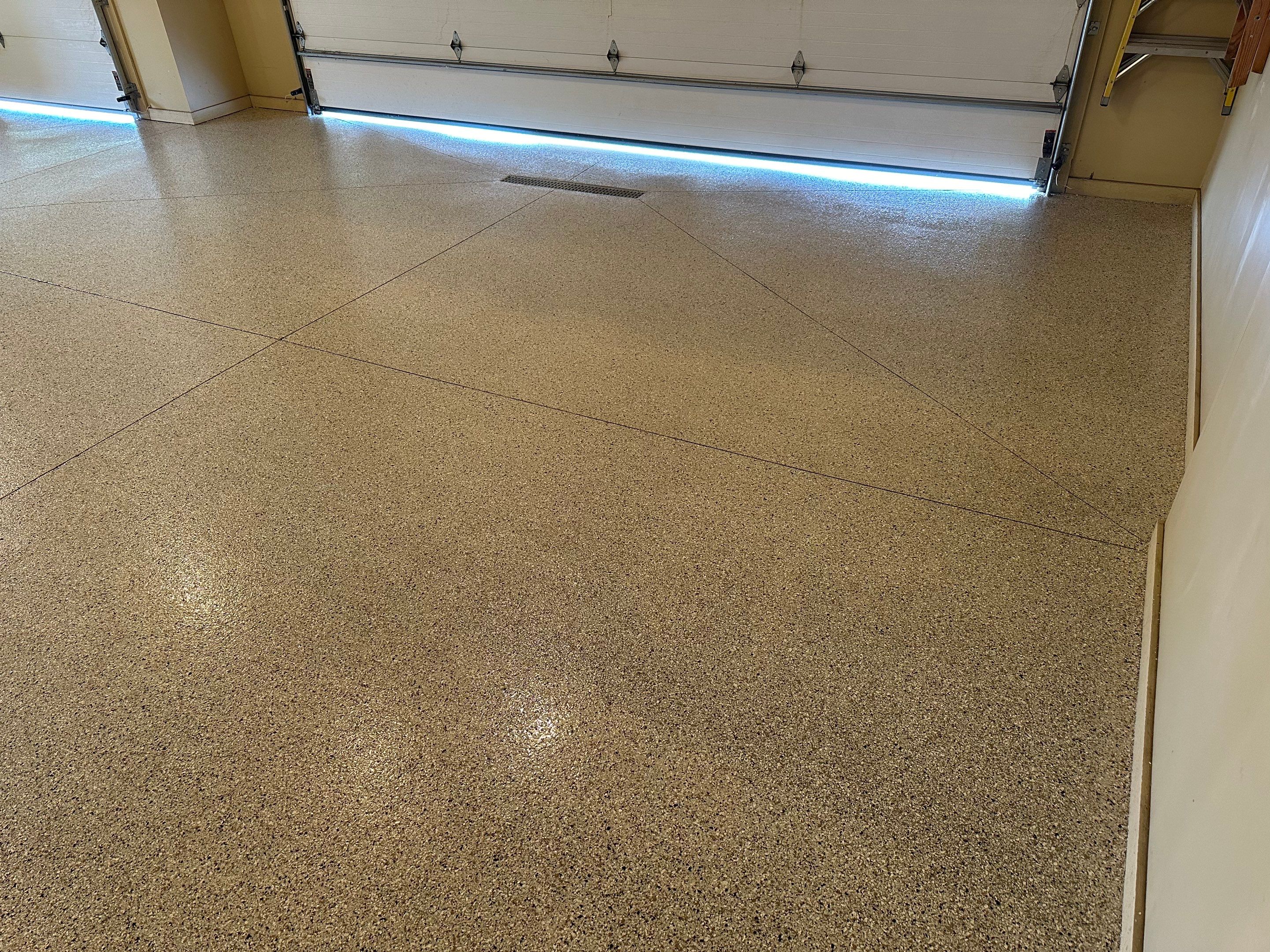 Sioux Falls Garage Floor Concrete Coating with Shoreline Flake Finish by Select Painting, Coatings & Garage Cabinets
