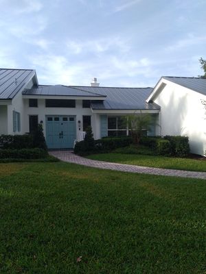 Residential Roofing Installation using 1" Nail strip metal roof