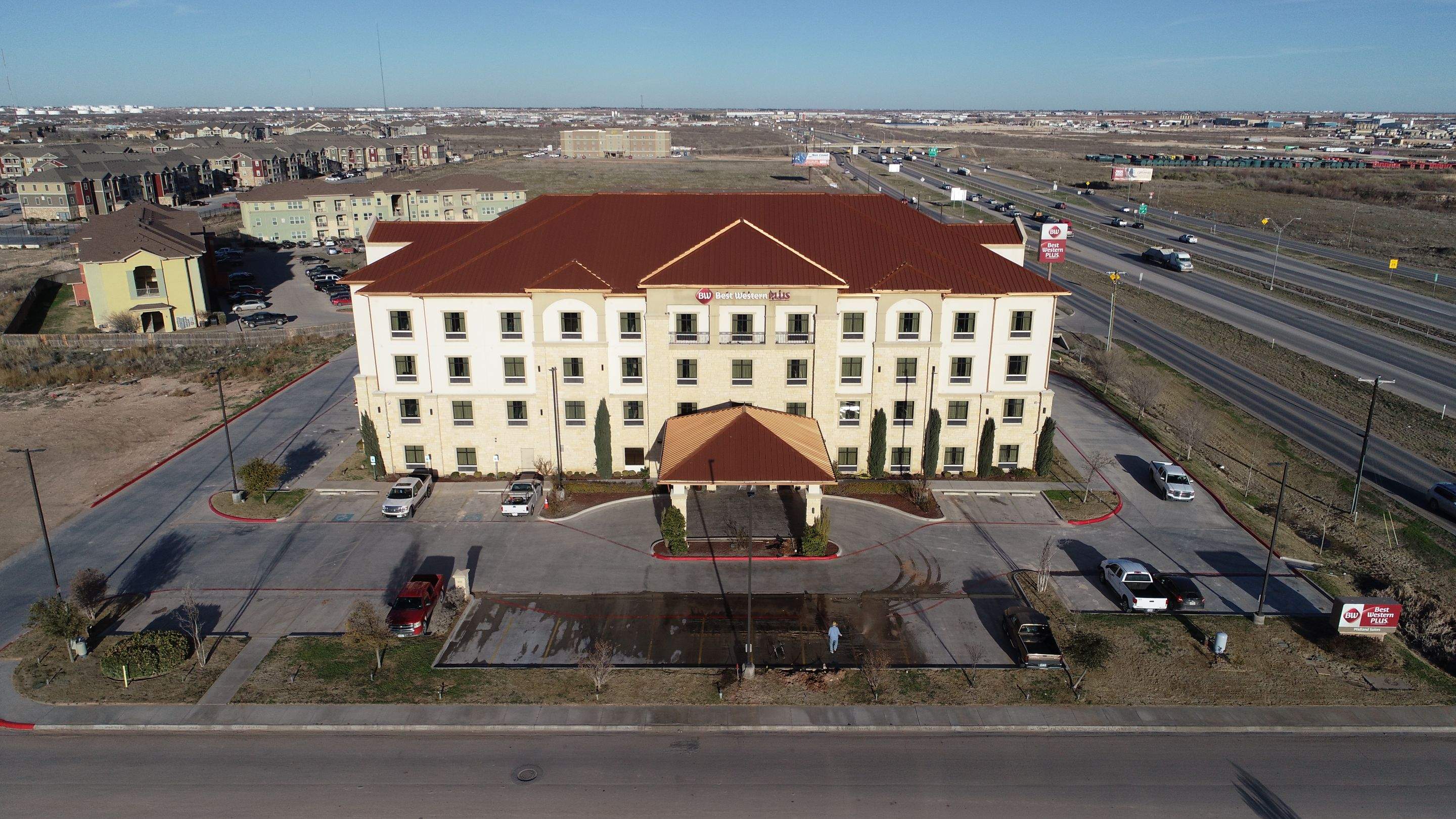 Commercial Roof Replacement for Best Western using Standing Seam Roofing - Midland, TX by Roof Experts