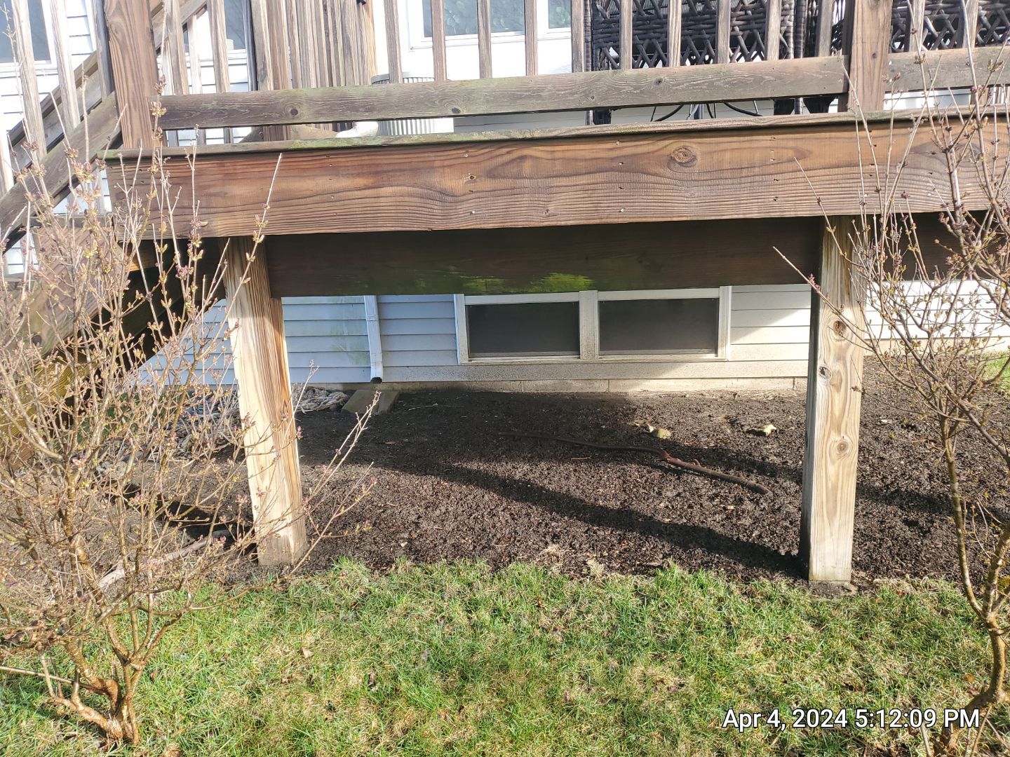 wood deck cleaning and staining by Northern Power Washing LLC.