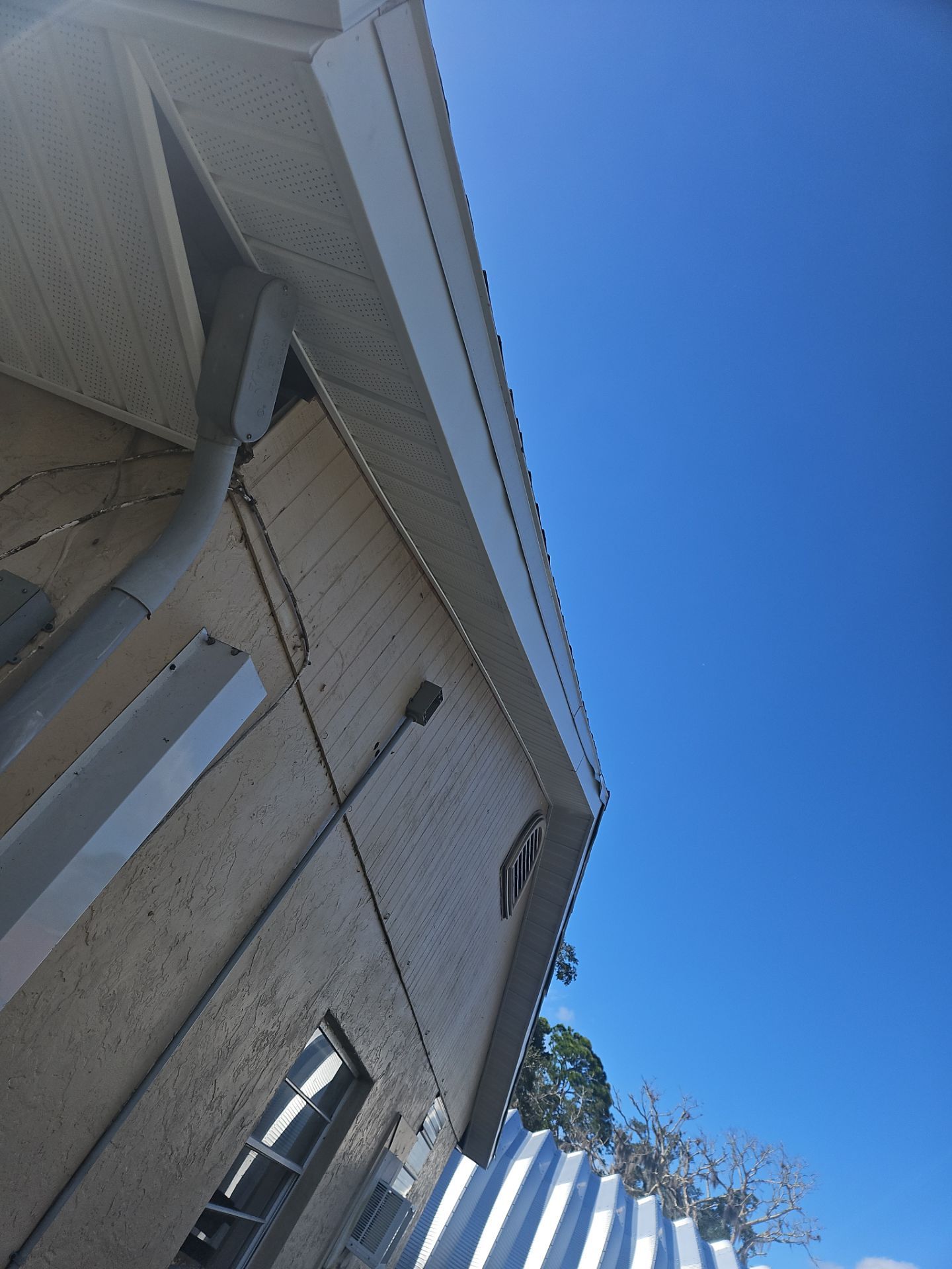 Soffit and Fascia Installation and Smooth Box Gutters and Downspouts in Sarasota FL by Gutter Professors
