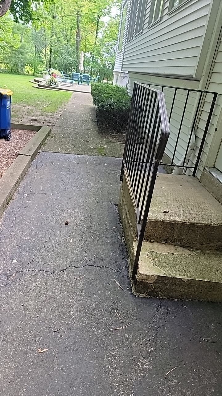 Housewashing  using Algaecide, soft wash soap by Northern Power Washing LLC.
