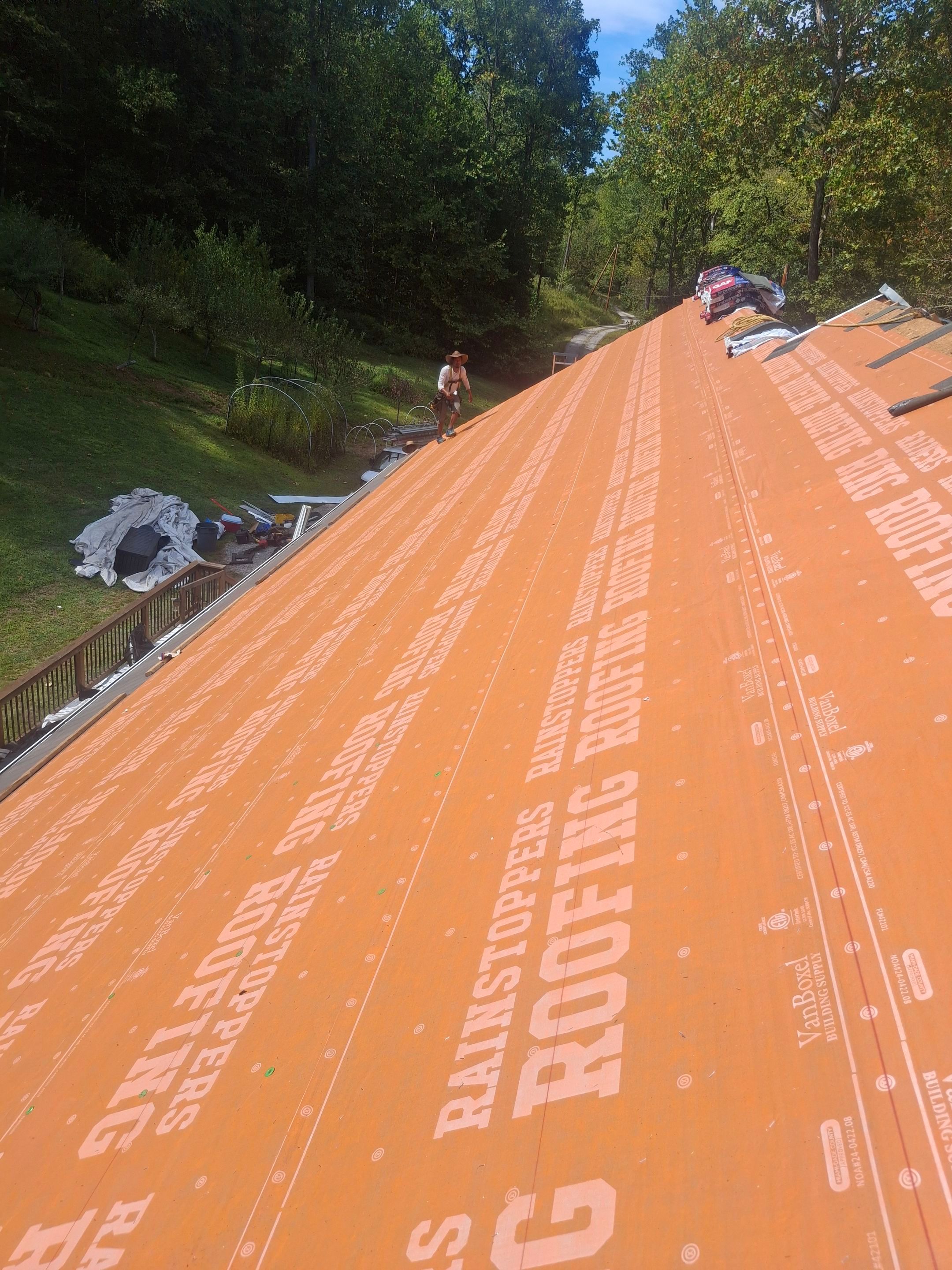 Residential Roofing Installation using GAF Timberline HDZ Charcoal by Rainstoppers Roofing