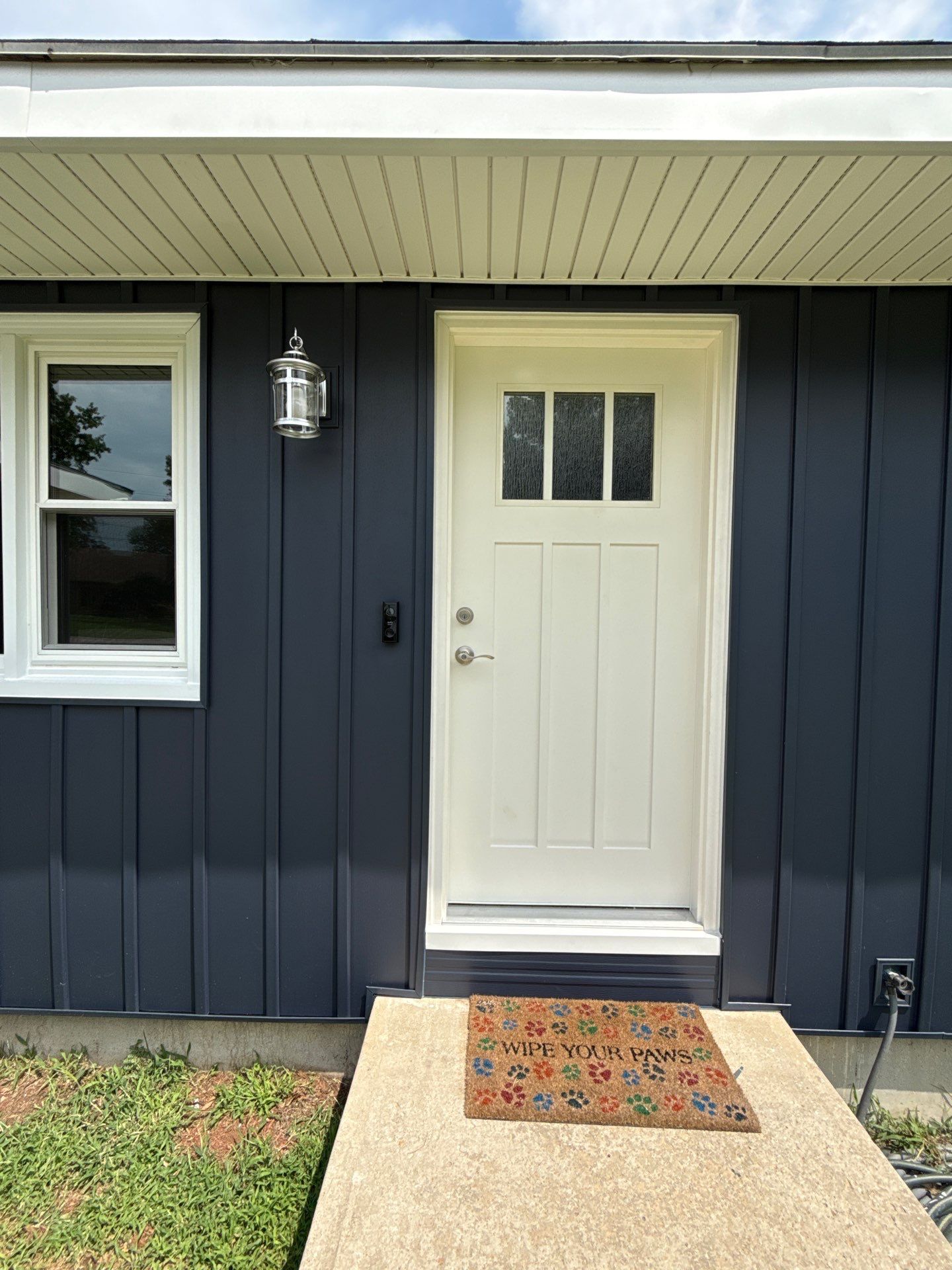 Indigo Board and Batten Siding and Window Replacement in Smithville by EEC Windows, Siding & Roofing