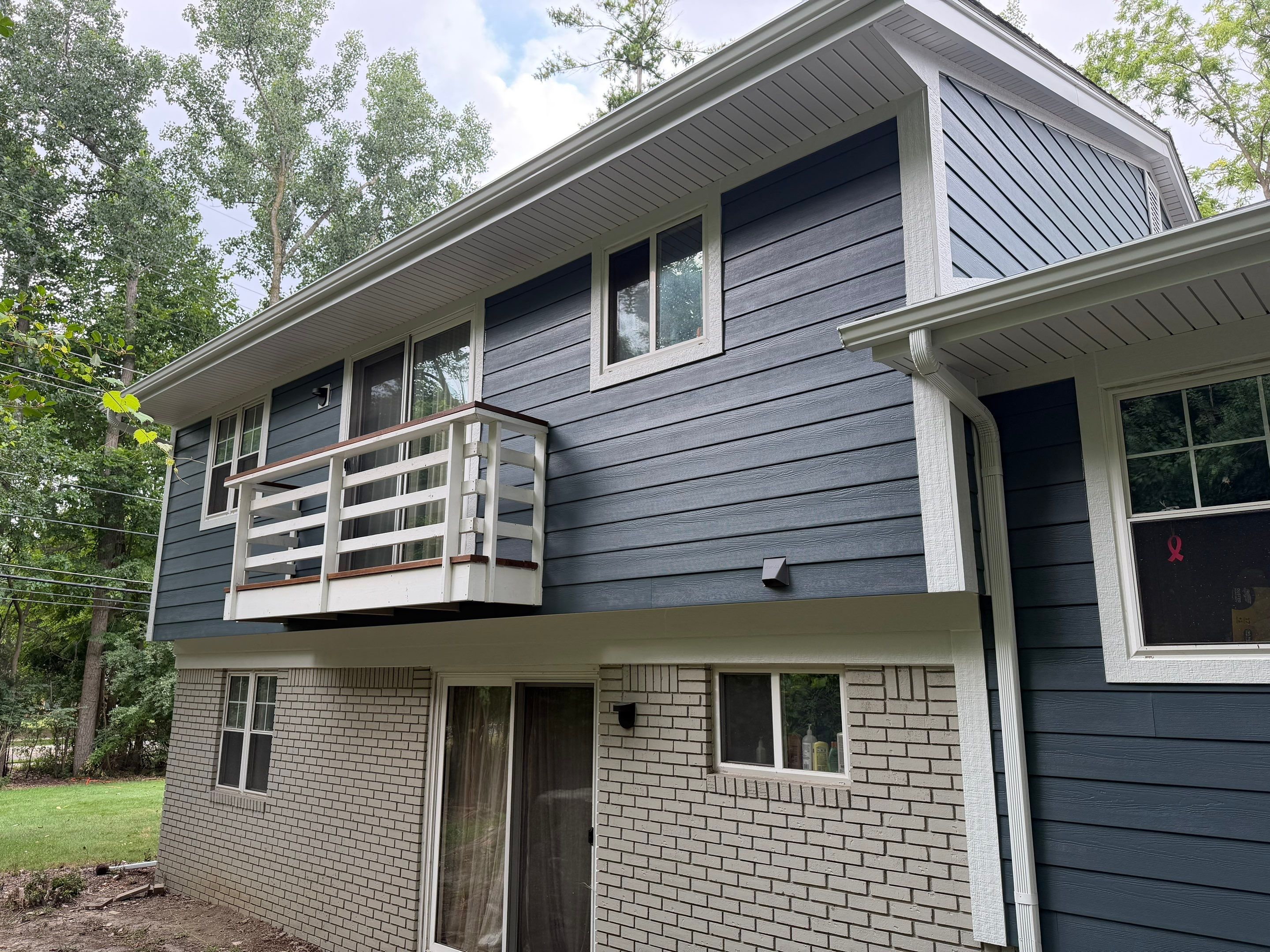 James Hardie Siding Replacement & Metal Roof by Bloomfield Construction & Restoration