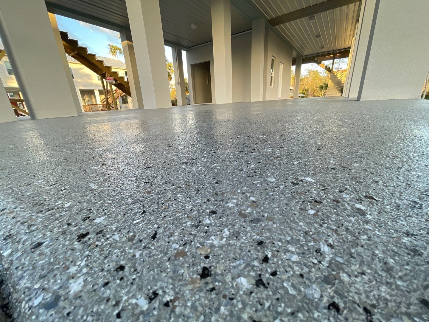 Under Side of Home in Hybrid Shale by Cross Creek Concrete Coatings