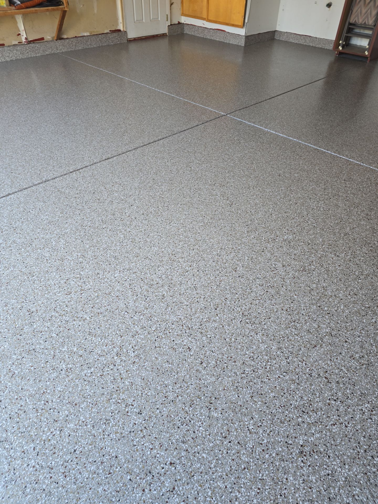 Garage Transformation using Pebble Beach by Croc Coatings, LLC