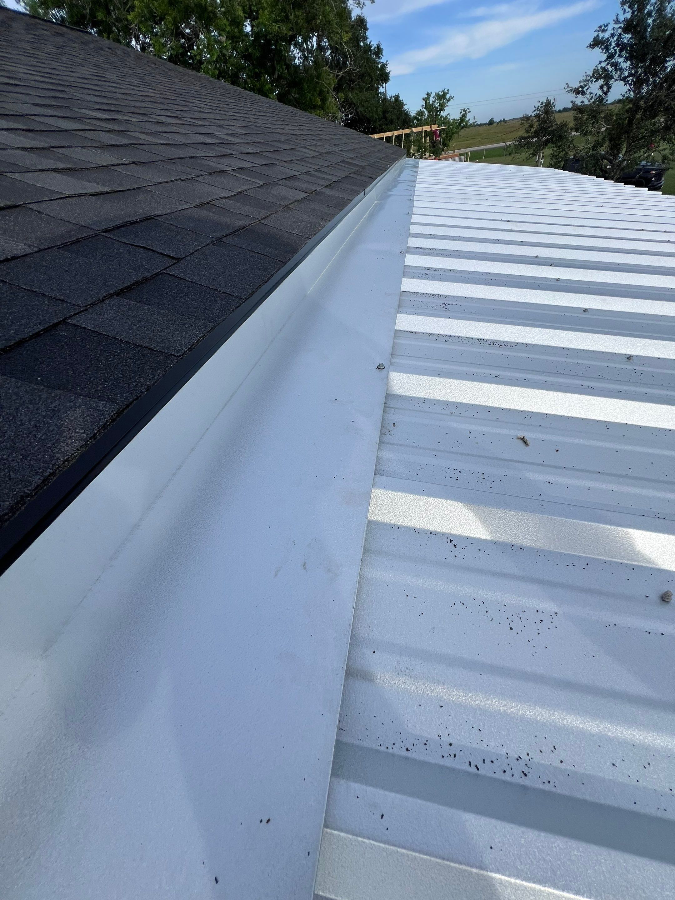 Residential Roofing Installation using Metal by Roof Repair Company