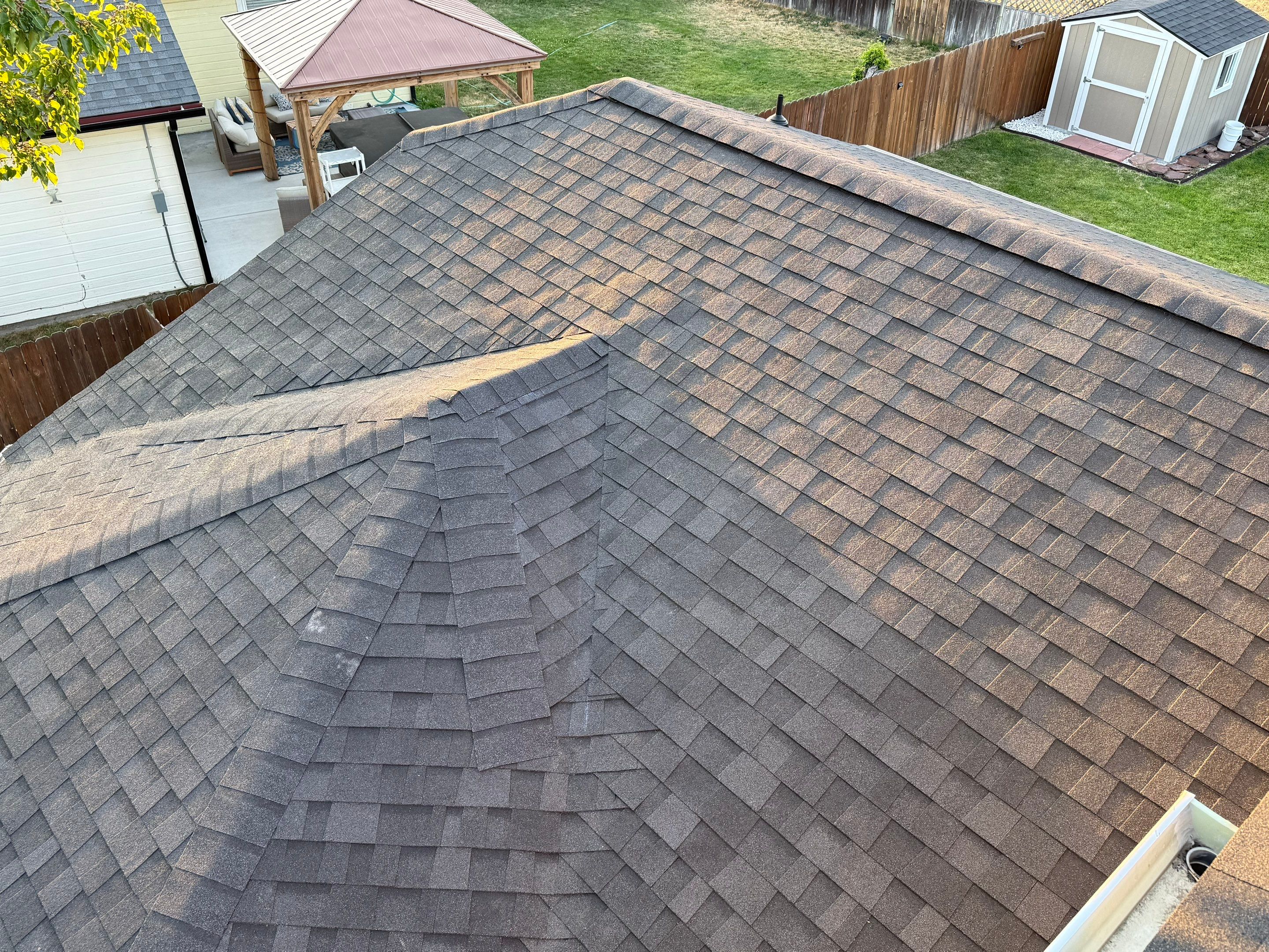 Residential Roof Replacement and Seamless Gutter Installation in Boise by Olive Roofing