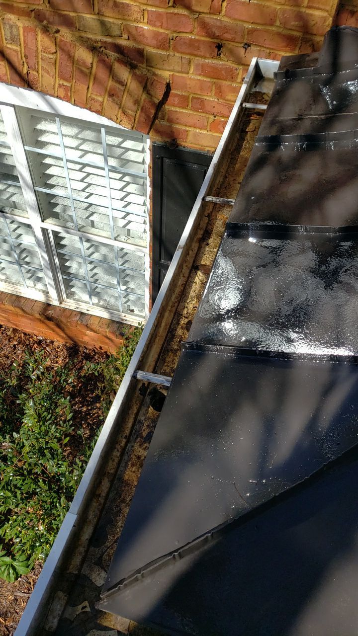 Gutter Cleaning using water by Power Wash Masters LLC