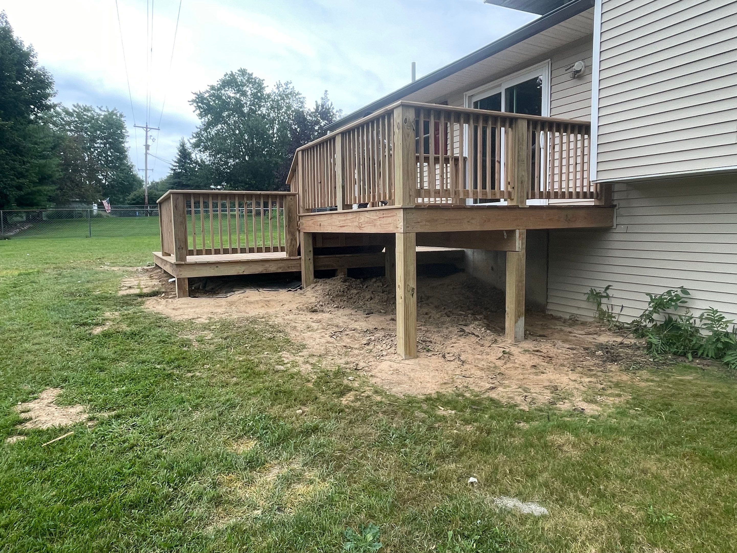 Deck Installation using Treated Lumber by Avalon Roofing and Exteriors