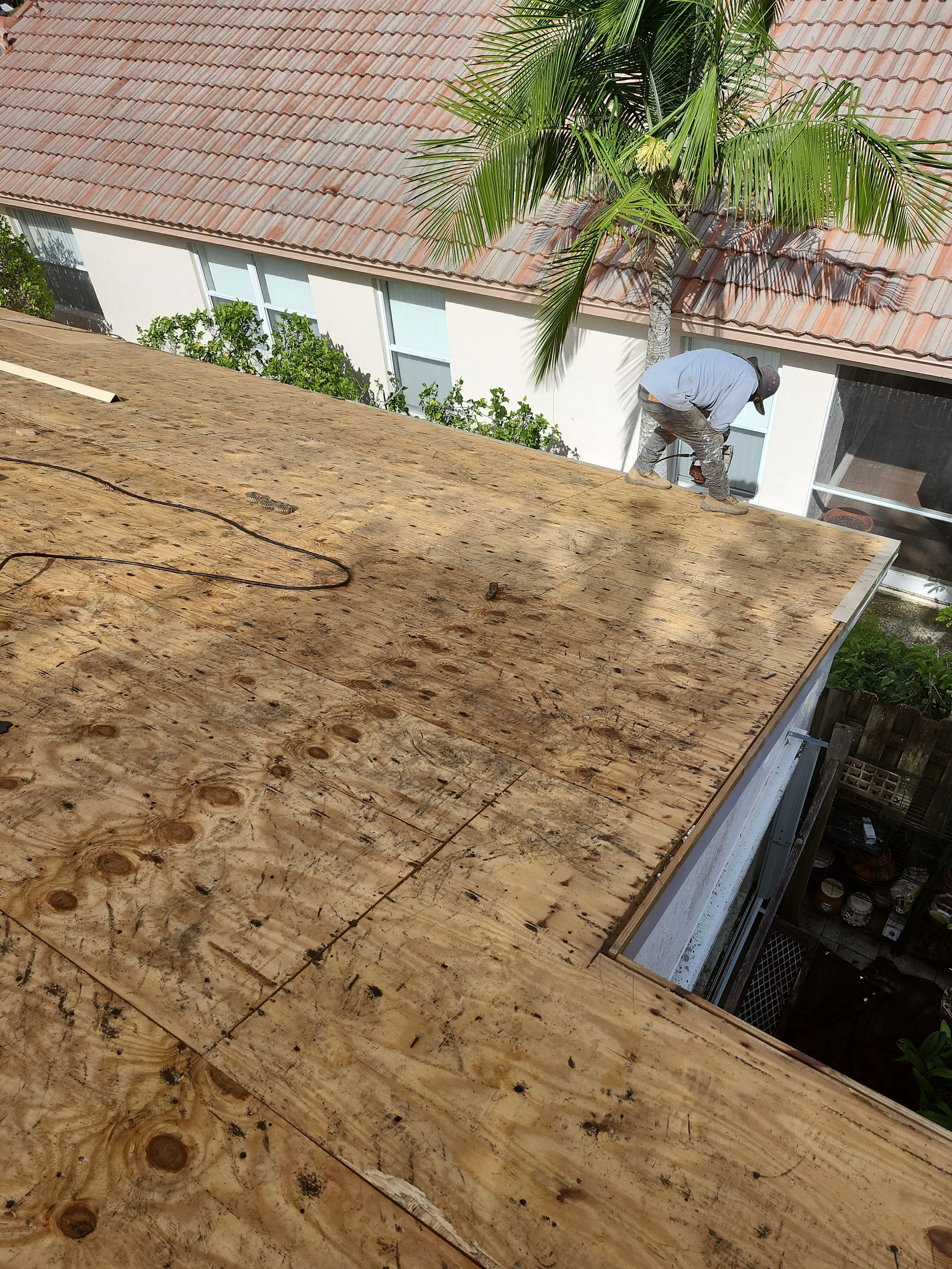 Concrete Tile Roof Replacement and Wood Decking Repair in Boca Raton by Aastro Roofing