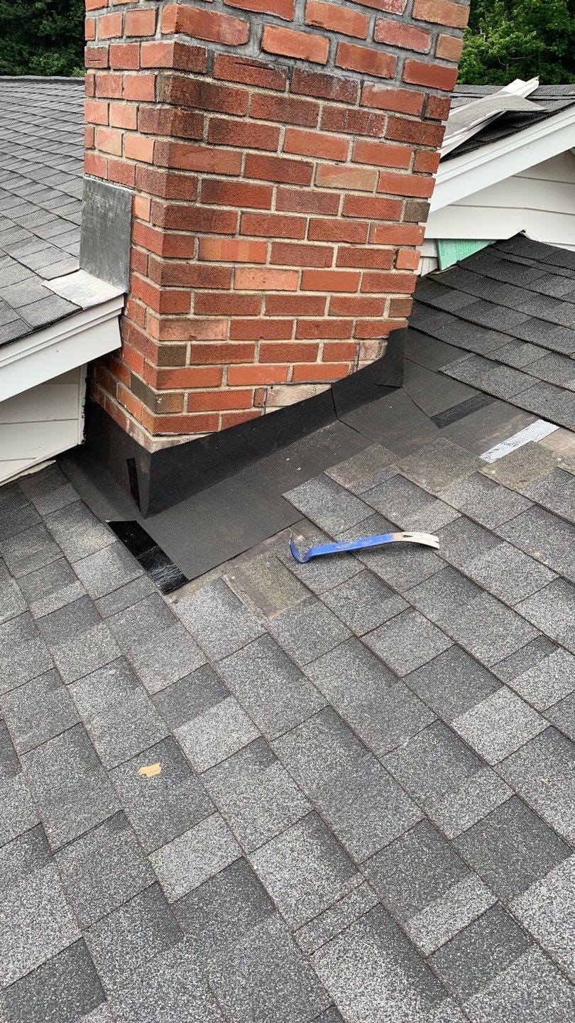 Residential Roofing Repair using Chimney Flashing by A Plus Exterior