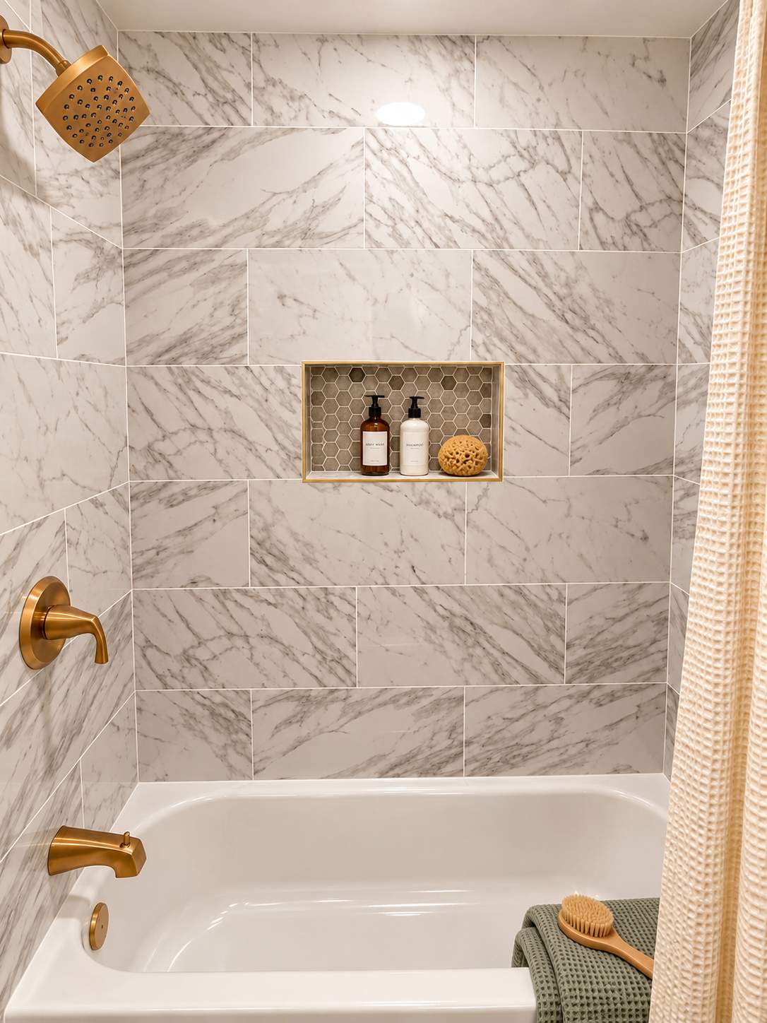 Modern Bathroom Remodel with Marble-Look Tile & Brushed Gold Finishes by Remodel Now