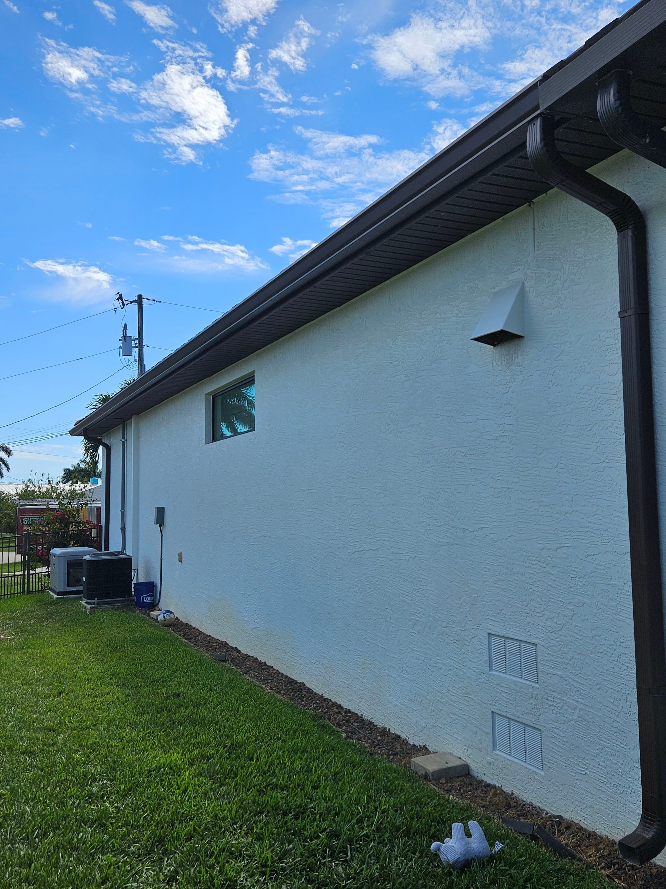 6 Inch Seamless Gutters using Musket Brown Seamless Gutters in Cape Coral FL by Gutter Professors