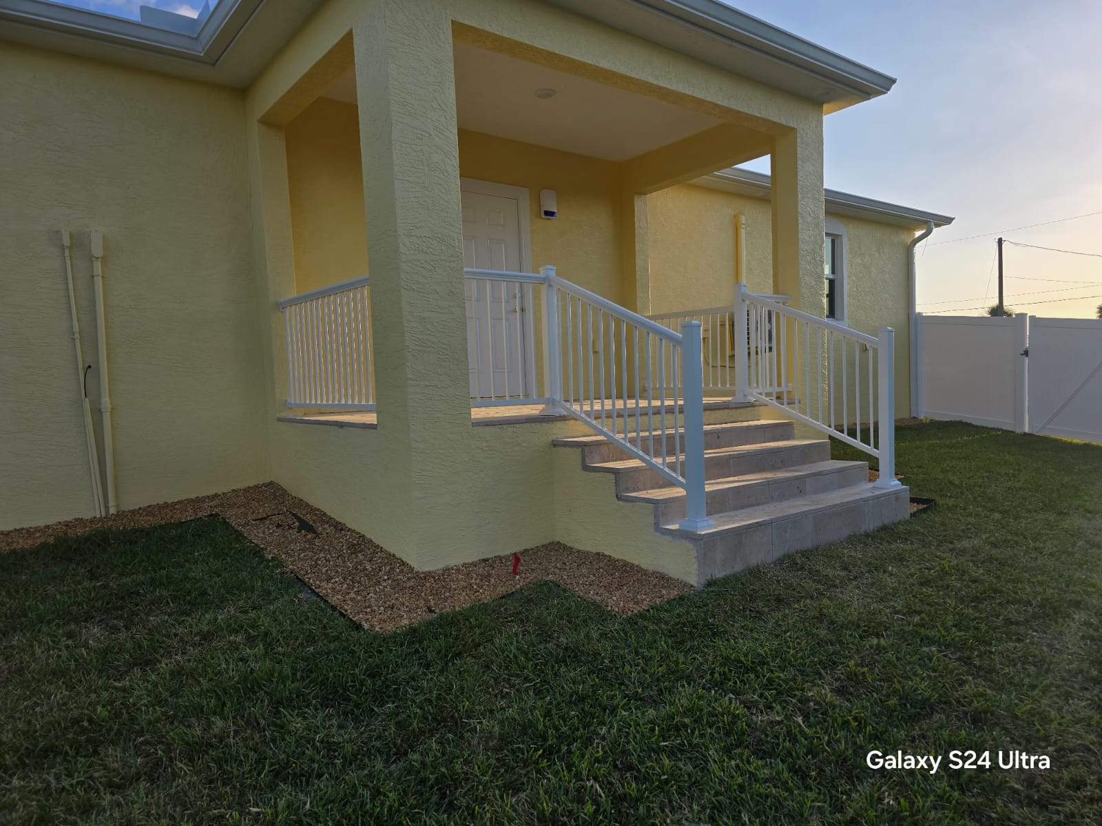Vinyl Privacy Fence and Porch Railing Installation in Port Charlotte by True Fence LLC