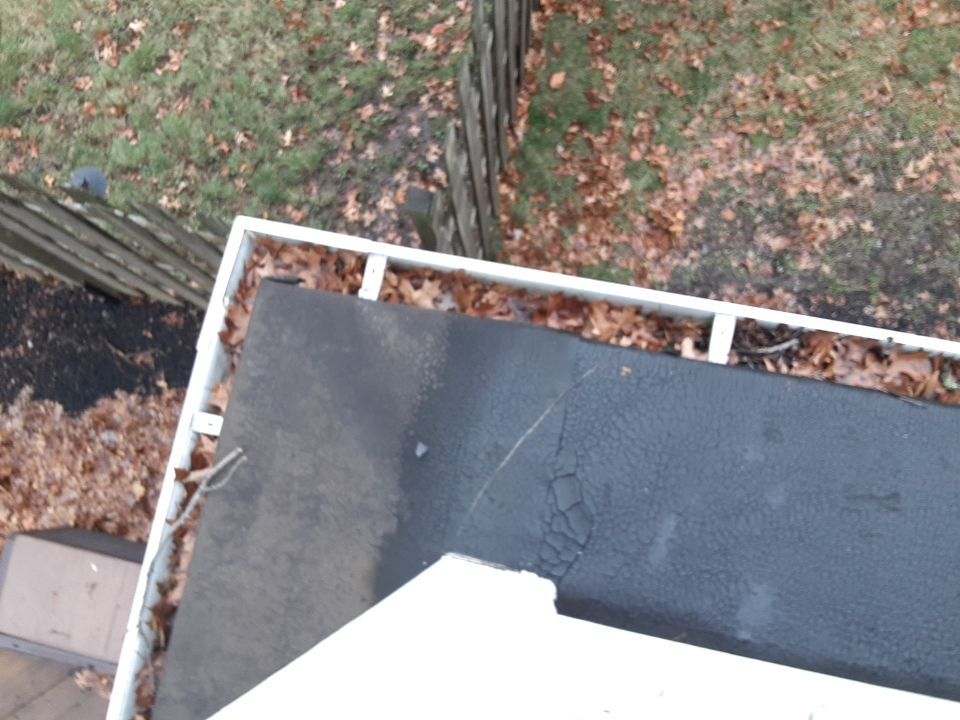 Residential Roof Replacement using Patio Roof by Absolute Roofing and Construction