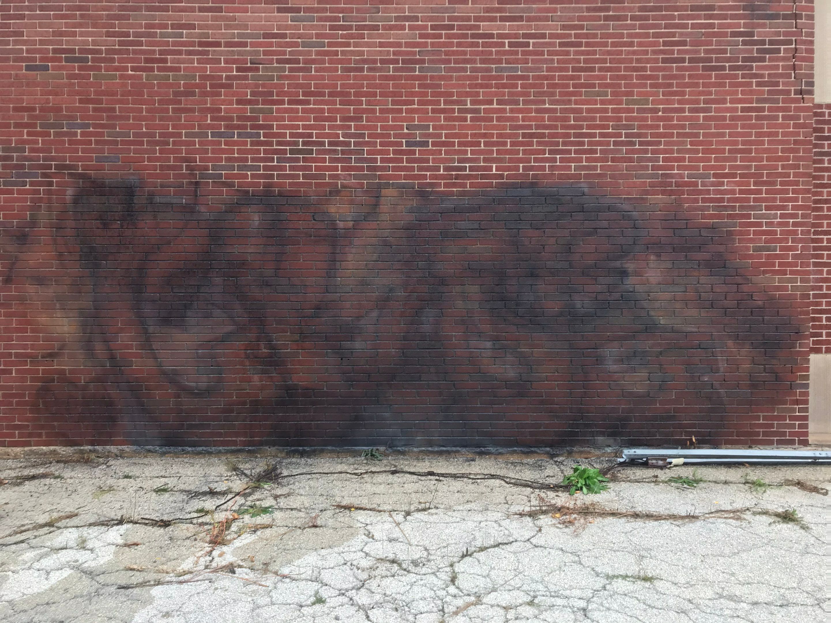 Graffiti removal  using Graffiti remover by Northern Power Washing LLC.