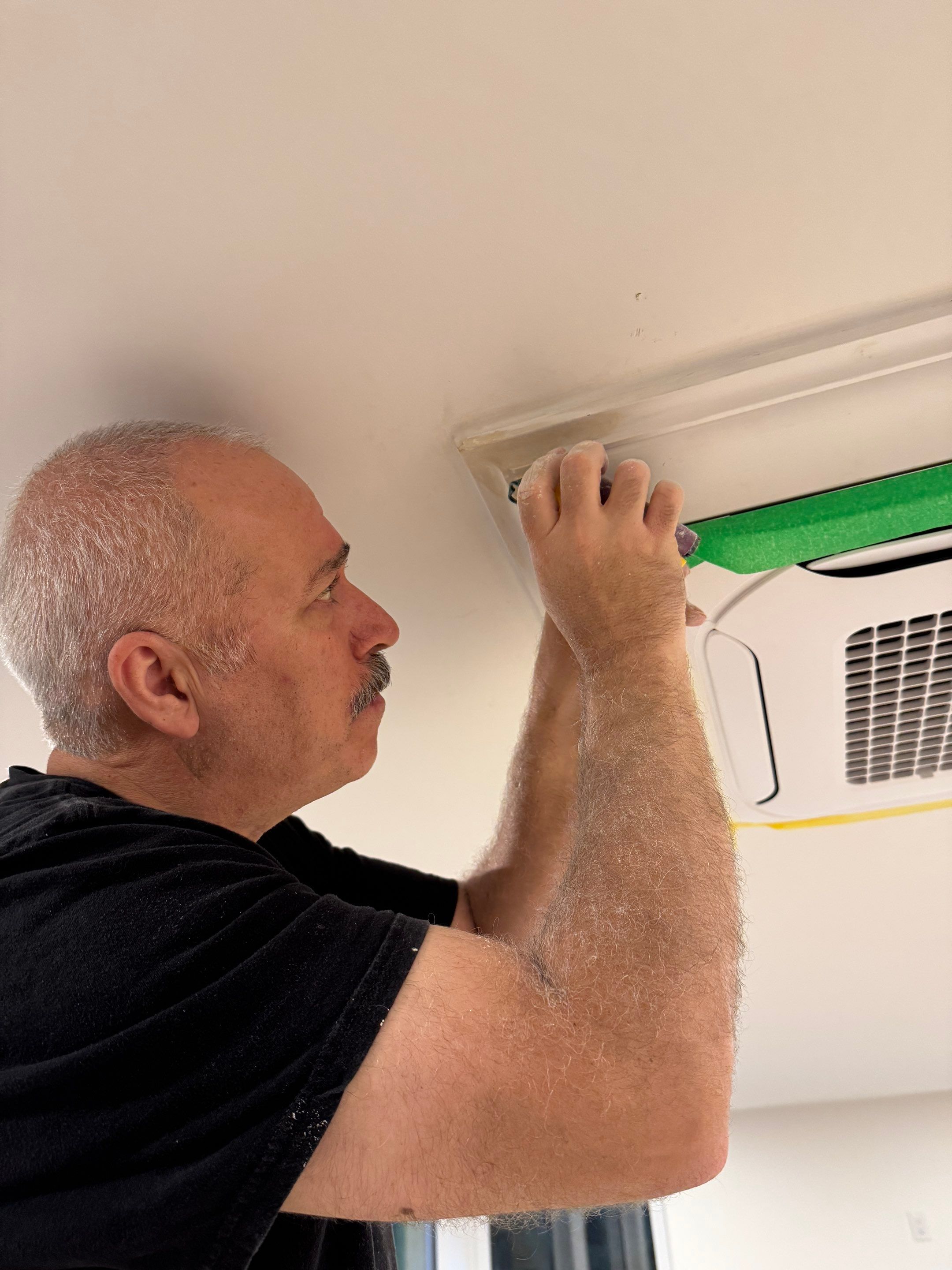 West Vancouver Custom Millwork: Heat Pump Trim & Window Finishing by YVR Construction Group