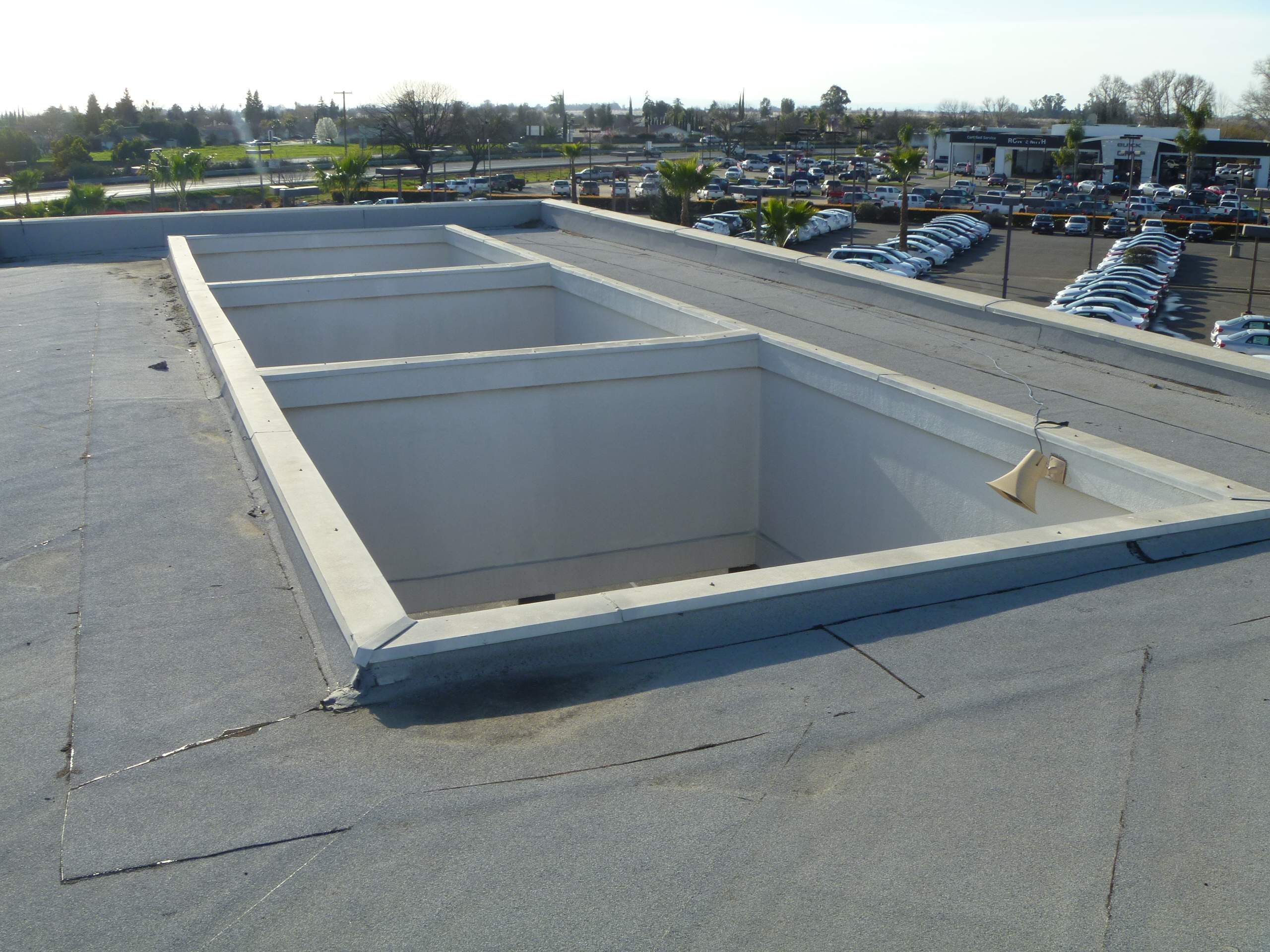 Commercial Roofing Installation using Spray foam and Conklin Benchmark/PUMA XL 18 yr warranty coatings by Straight Edge Roofing Inc