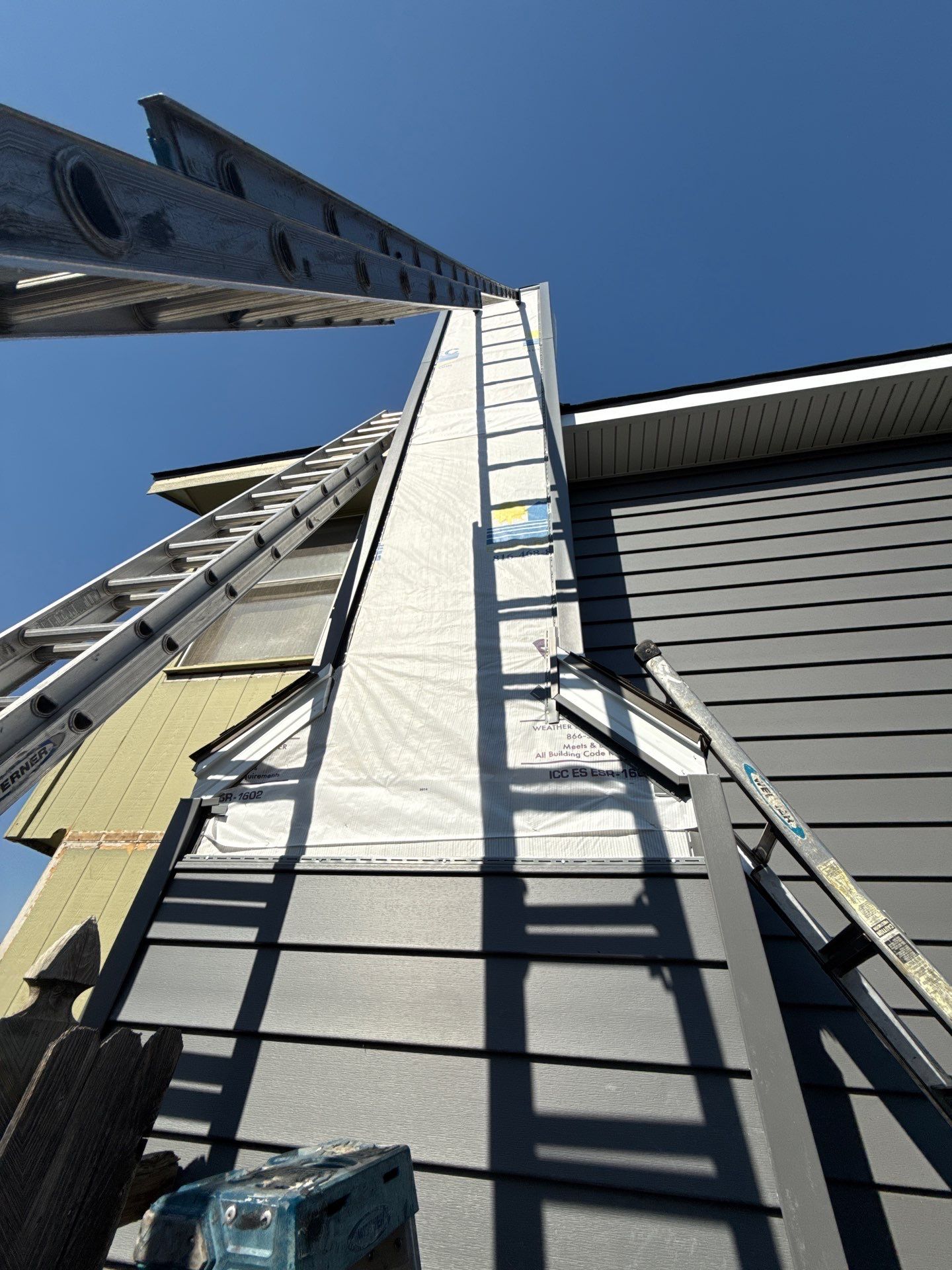 Split Entry in Smokey Ash Craneboard D7 by EEC  Windows, Siding & Roofing 