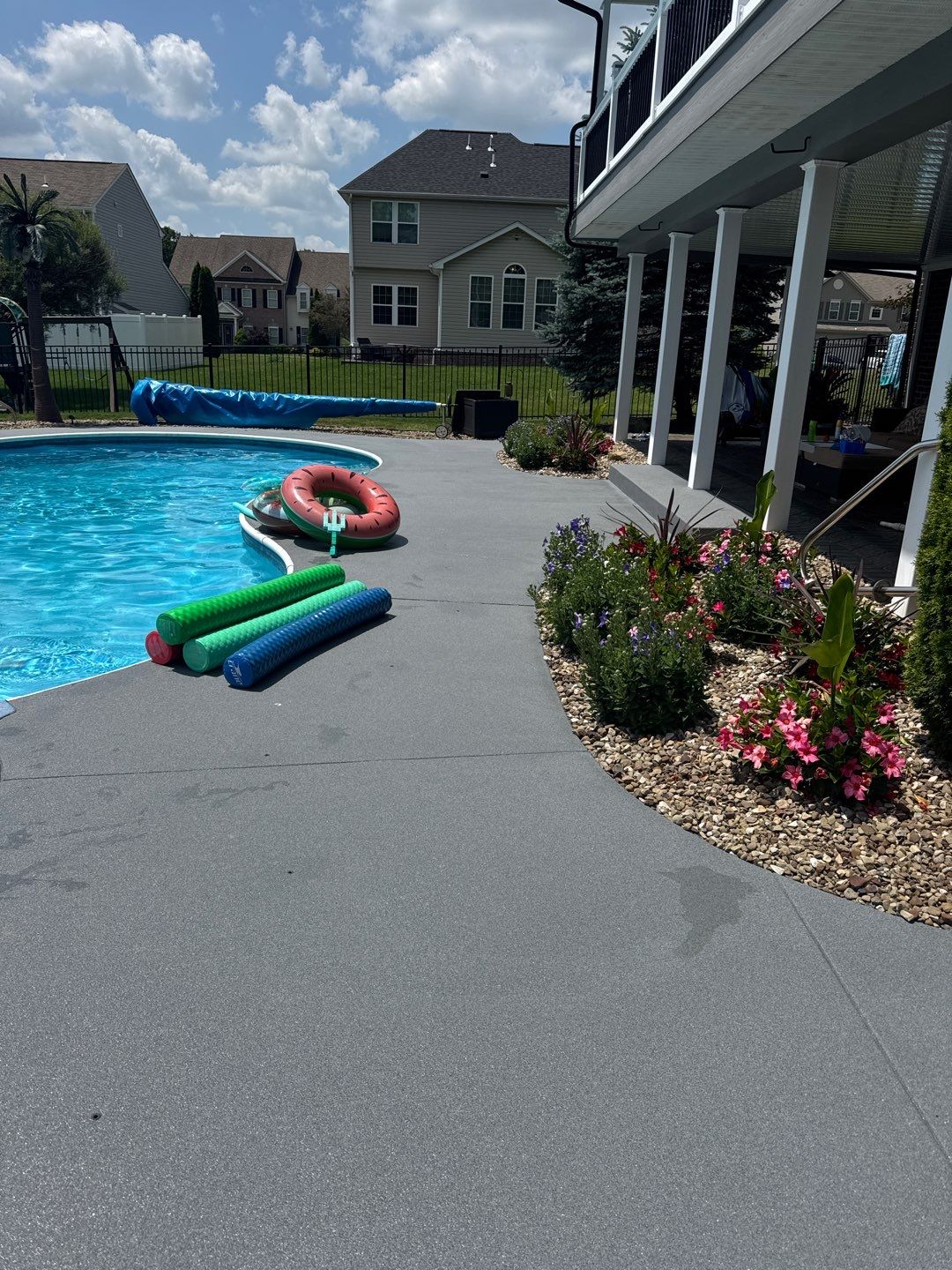 Twilight Pool Deck / Patio Project in Beaver falls by Floors in a Day, Inc