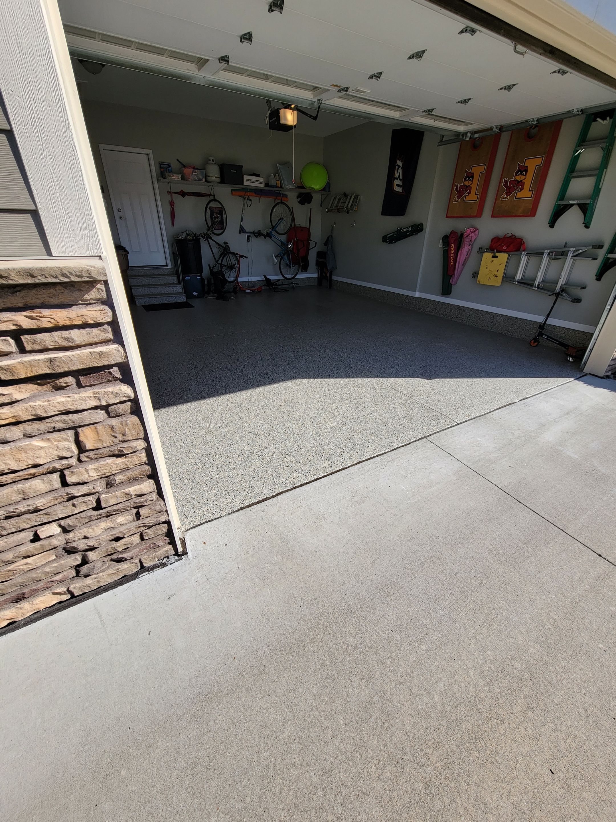 Grimes, IA Transformation: Professional Grade Garage Floor Coating by Revival Concrete Coatings