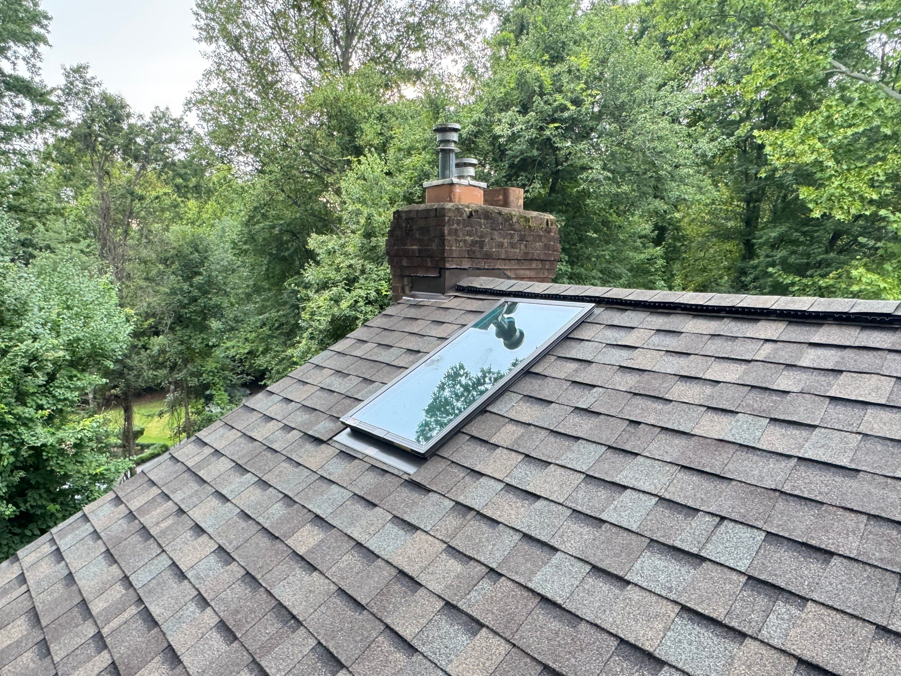 Comprehensive Architectural Shingle Roof Replacement and Skylight Installation in Laurel by First Chesapeake Roofing