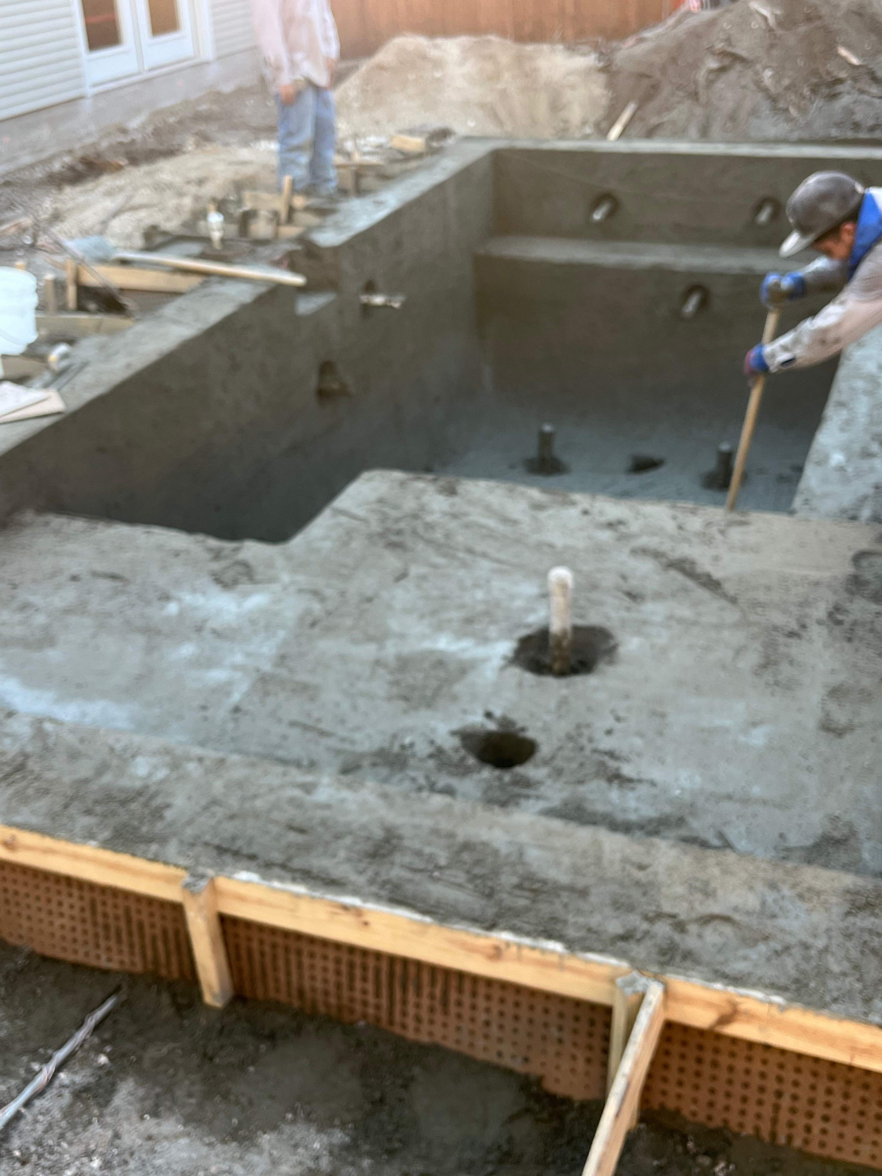 Modern Plunge Pool with Dark Interior and Paver Patio by Pinnacle Pools and Spas - DFW