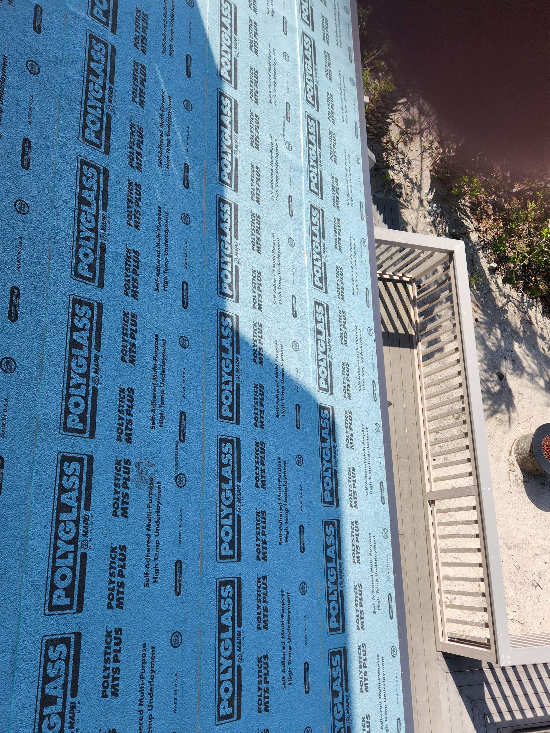 Residential Roofing Installation using Gulf Coast Metals Gulf Seam Panels by Four Peaks Roofing