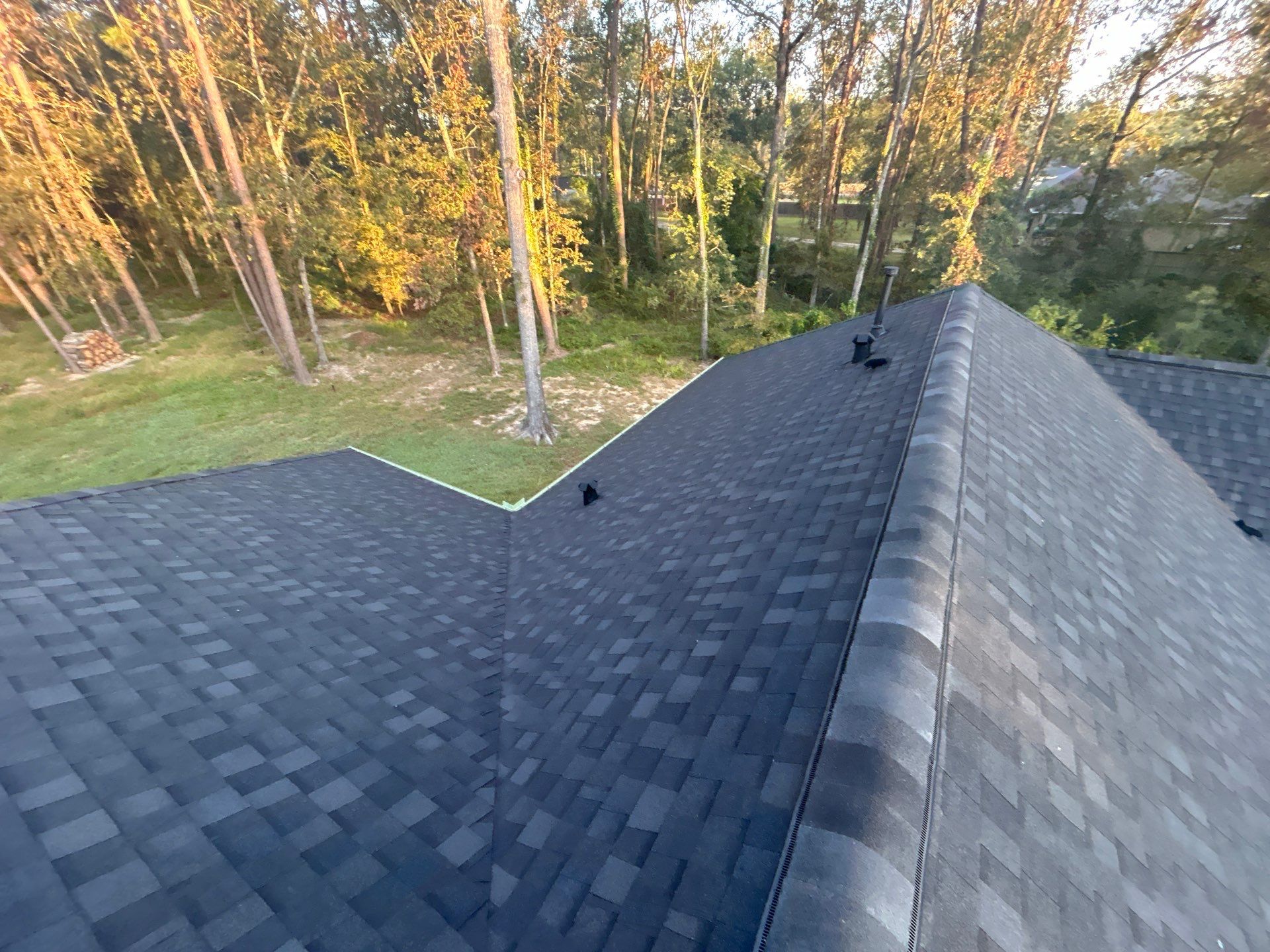 TAMKO Titan XT Rustic Black by STX Roofing