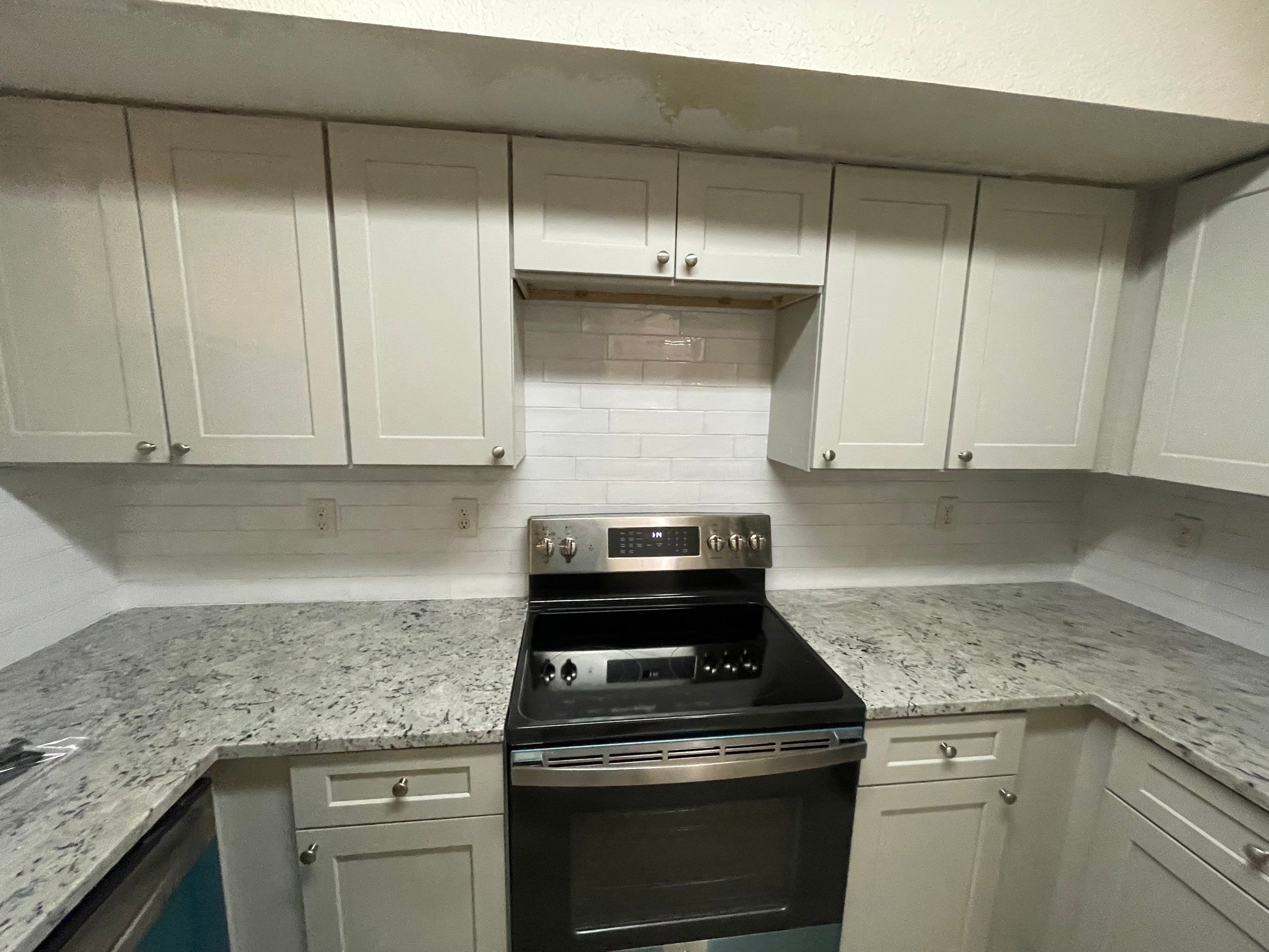 Home Remodel using LVP Flooring and Cabinets by HandyMangum