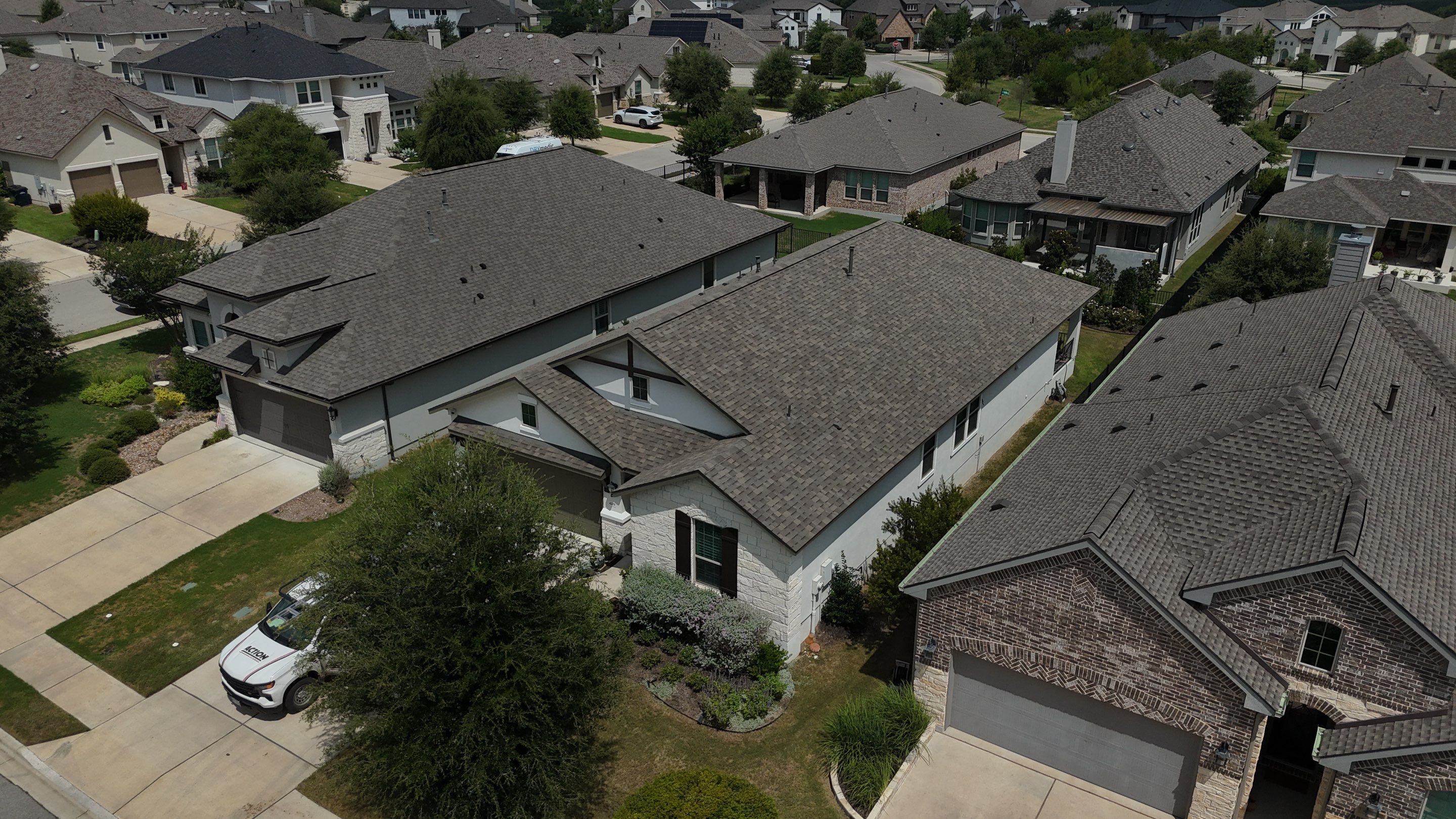 Residential Roof Replacement using Malarkey - Vista AR - Weathered Wood Plus by Action Exteriors Austin