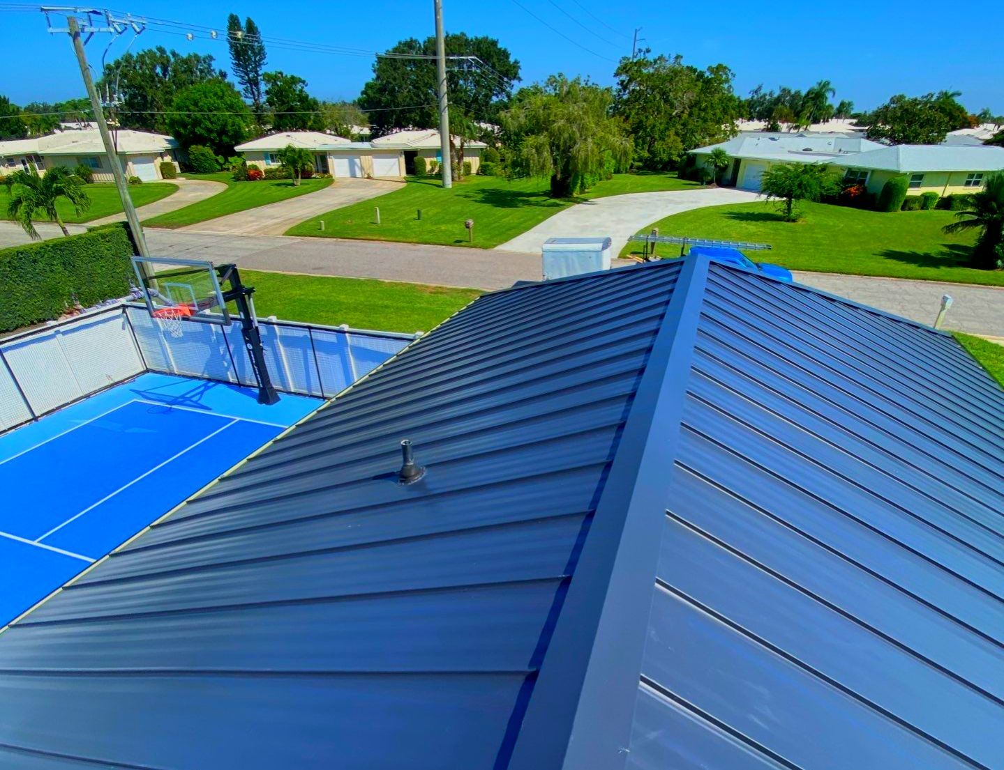 Metal Roofing System by Rooster Roofing, LLC