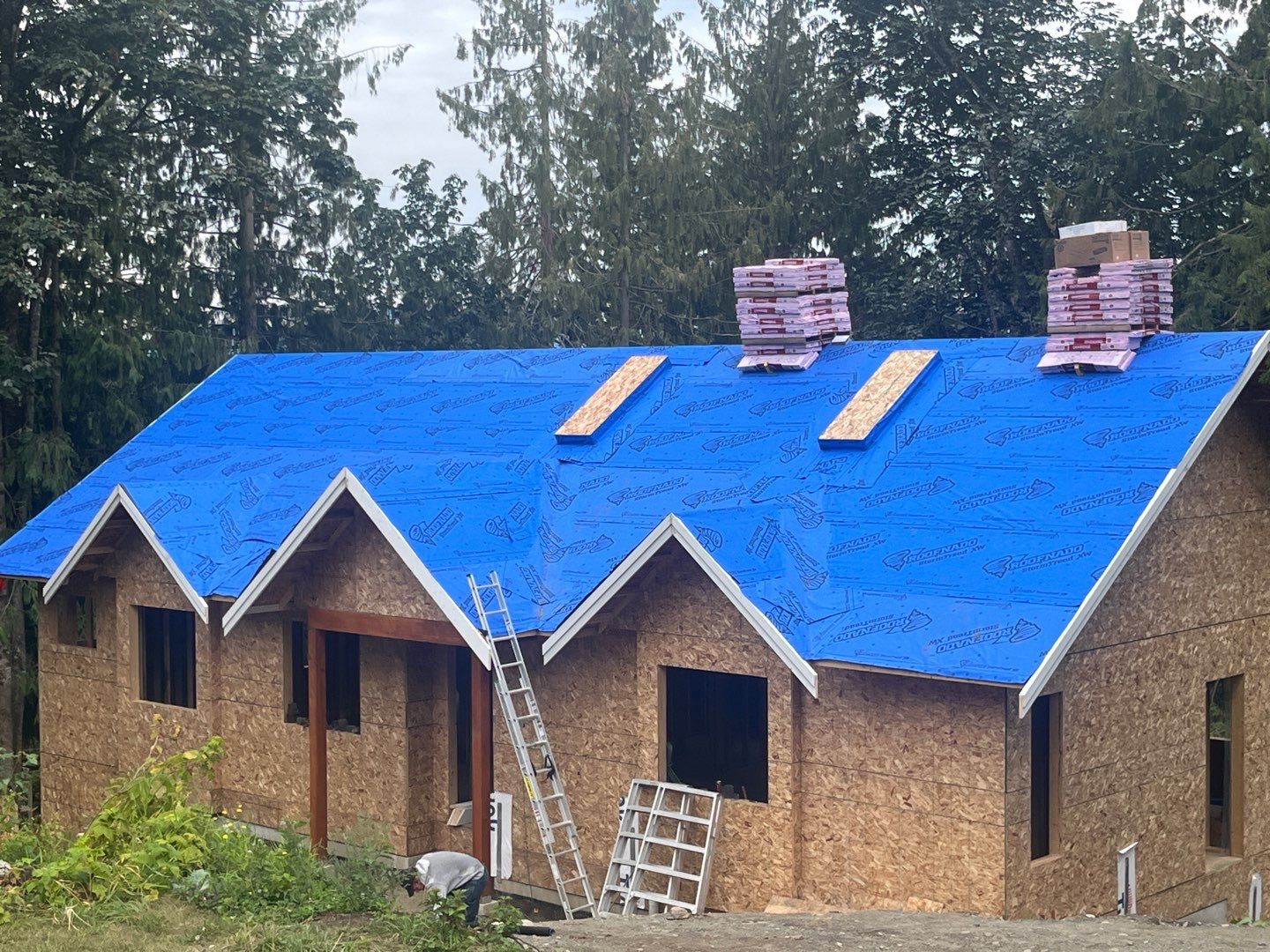 Residential Roofing Installation using OC Oakridge shingles by Top Notch Roofing Inc