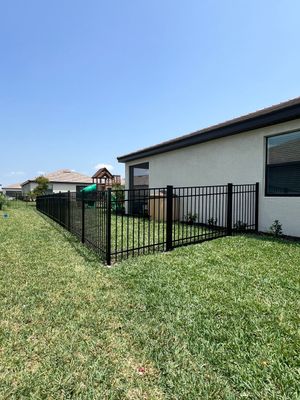 Aluminum Fence Installation using Black 3 Rail Aluminum Fence