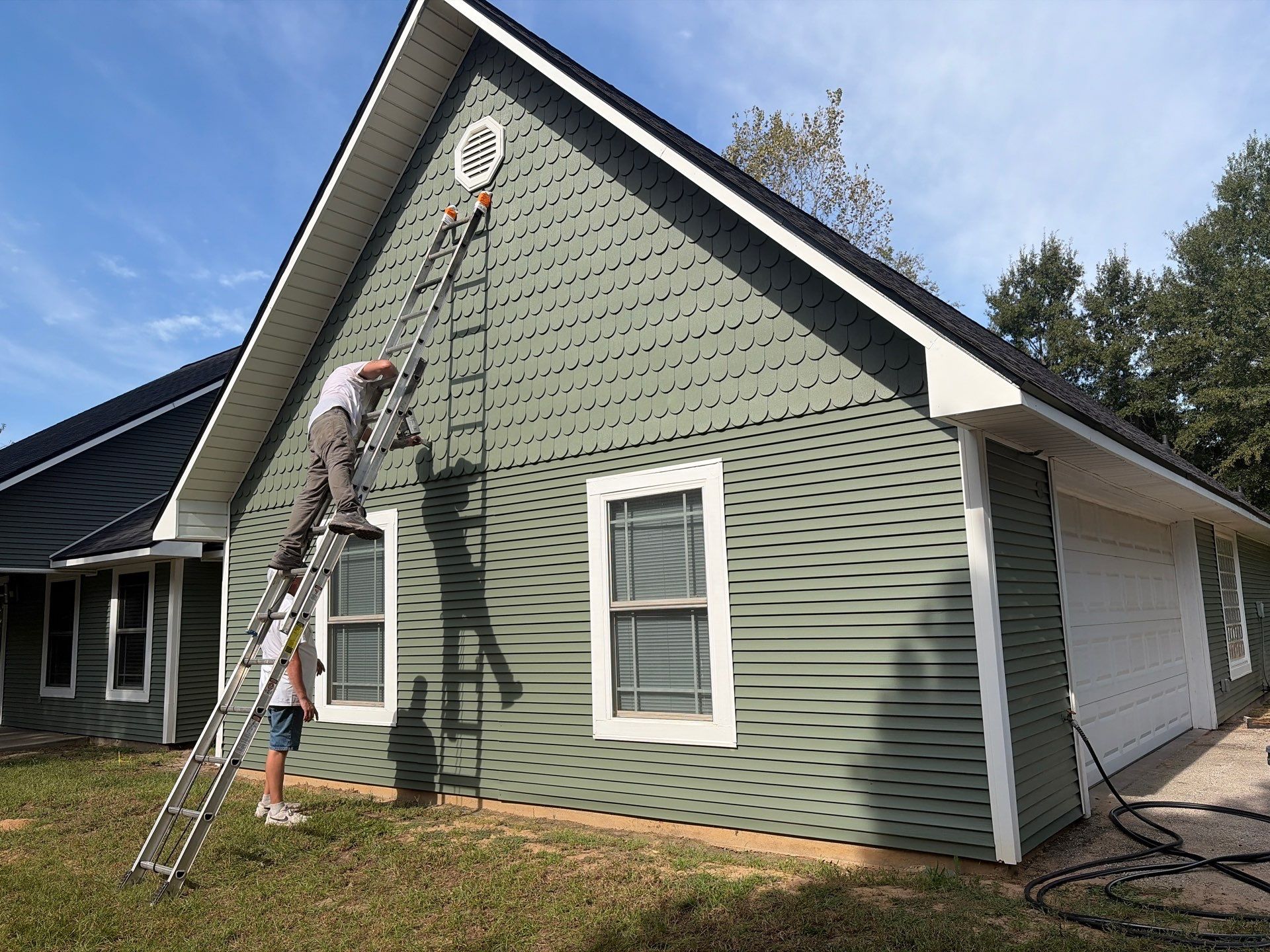 From Aged Yellow to Fresh Green in Frankston, Texas by Quality Coats Painting