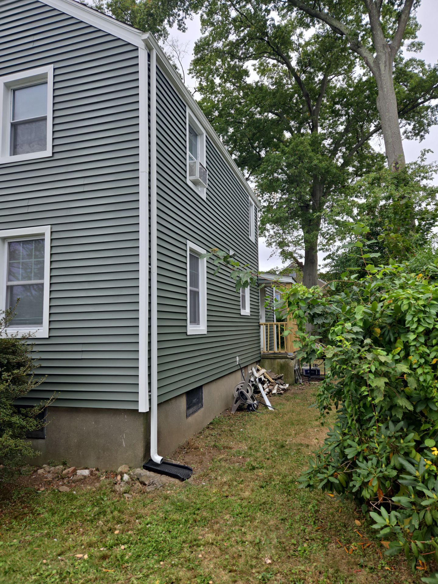 Siding Installation using CertainTeed Monogram Vinyl Siding - D4 - Forest by A Plus Exterior